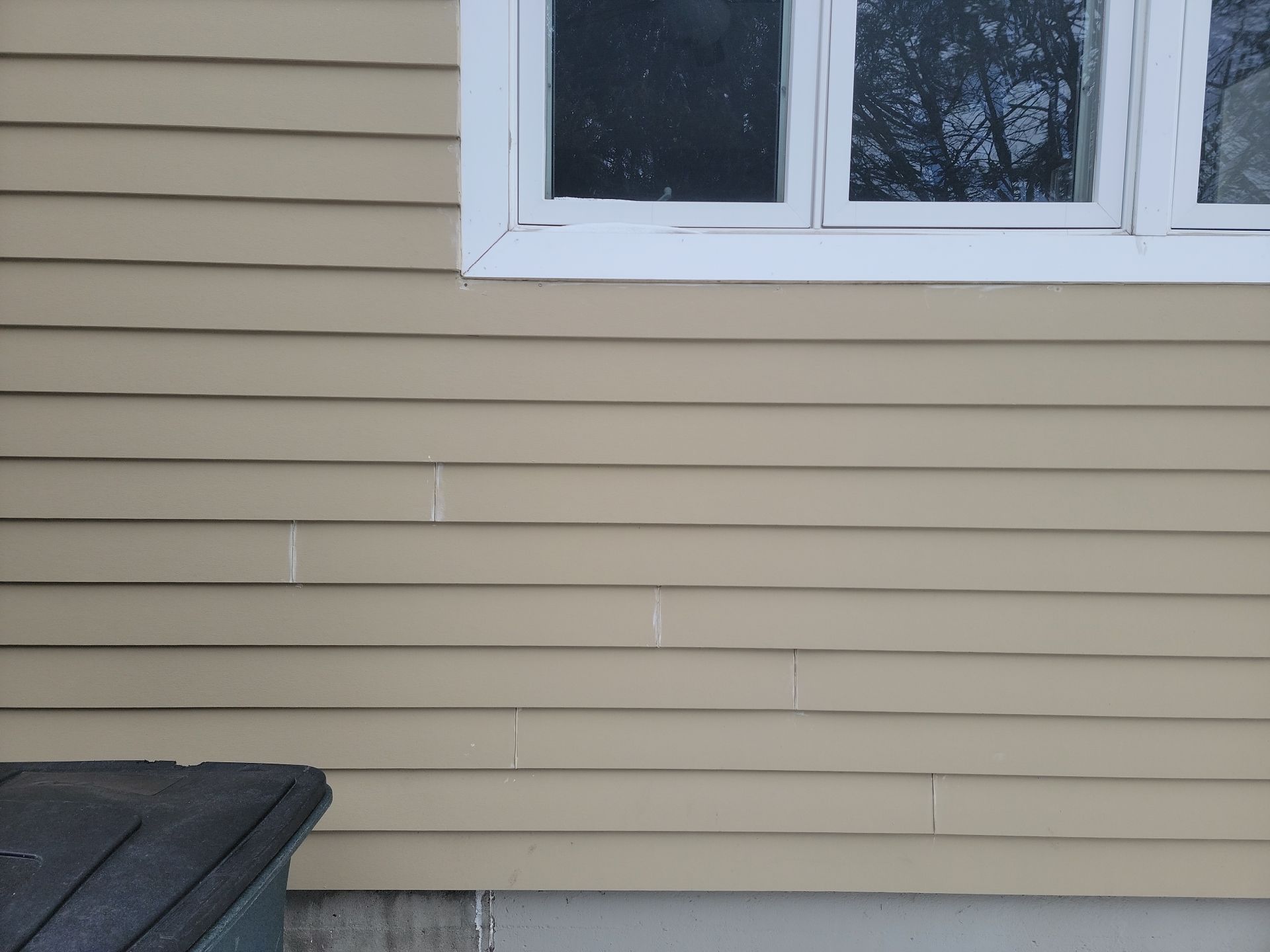 James Hardie siding, new metal roof and couple windows being installed. by UBrothers Construction