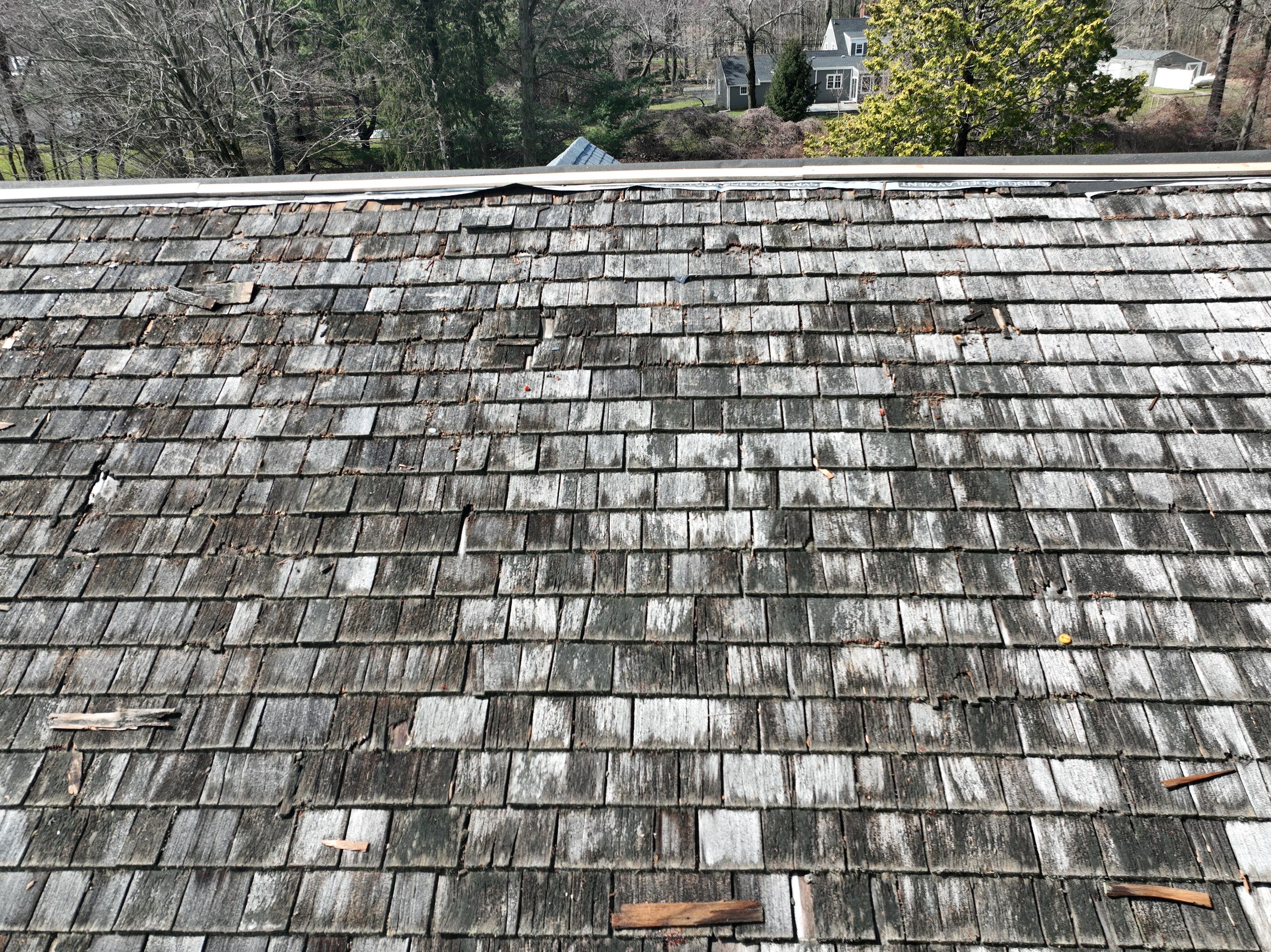 Residential Roofing Installation using Vermont Slate by A Plus Exterior