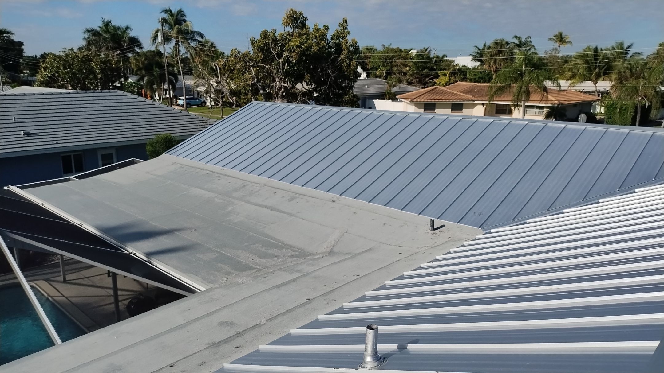 Residential Roofing Installation using 1" Nail strip metal roof by BLUES BROTHERS CONSTRUCTION CORP