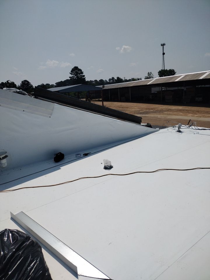 Office Building in Magnolia by Hostetler Roofing