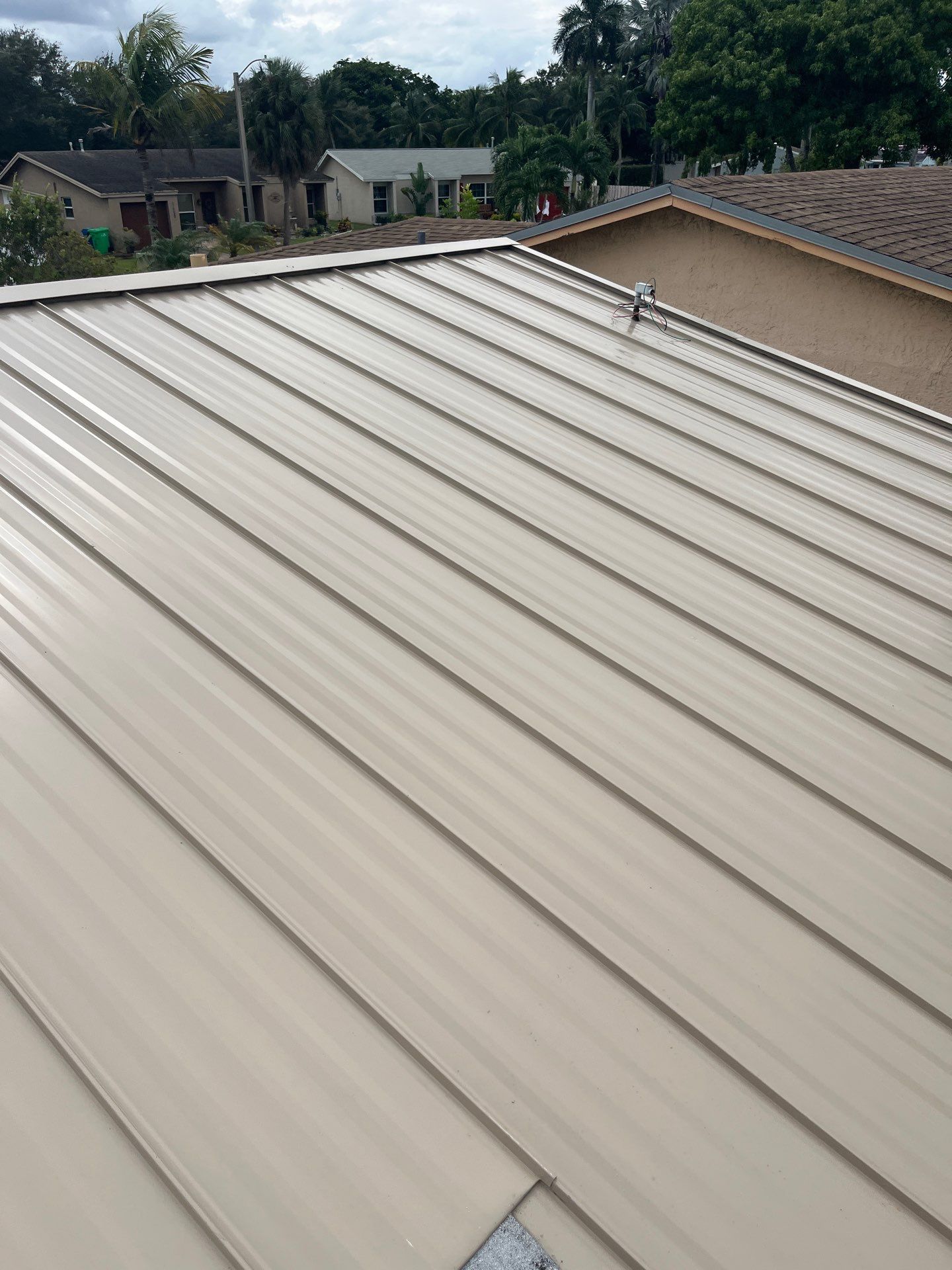 Sandstone Standing Seam by Reimagine Roofing