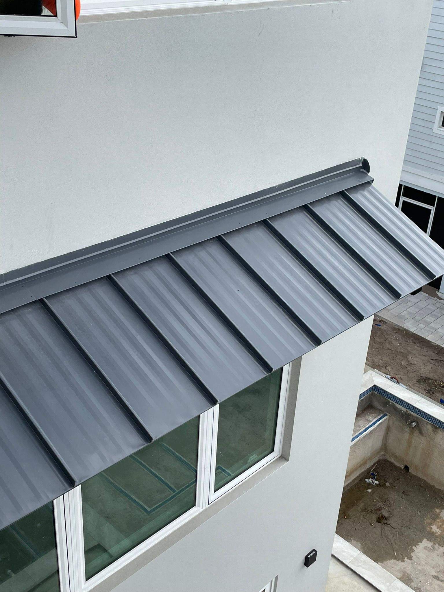 .032 Aluminum 1.5" Mechanical Seam Charcoal Gray by Total Roofing System The Metal Roof Experts