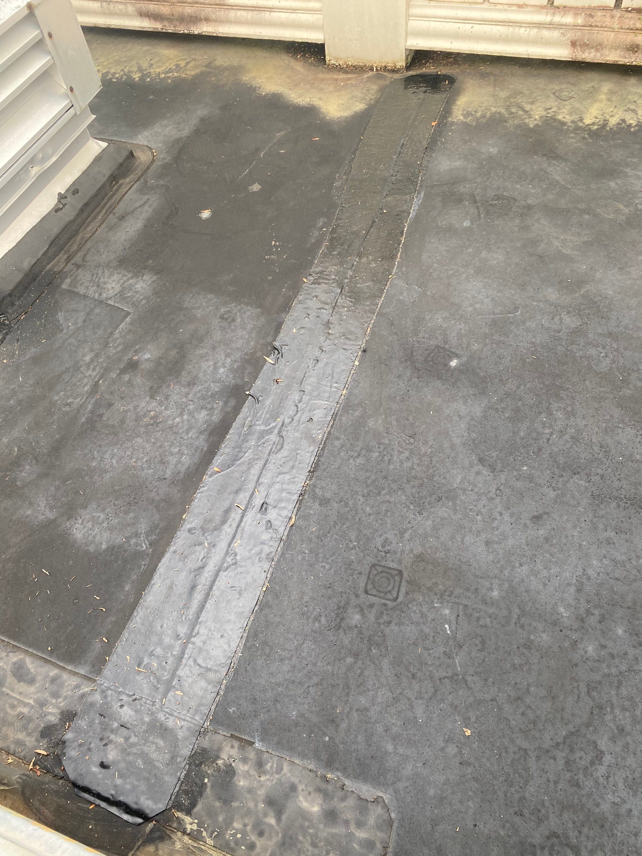 Lorton: EPDM Flat Roof with Partial Slate Replacement by RM Banning, Inc.