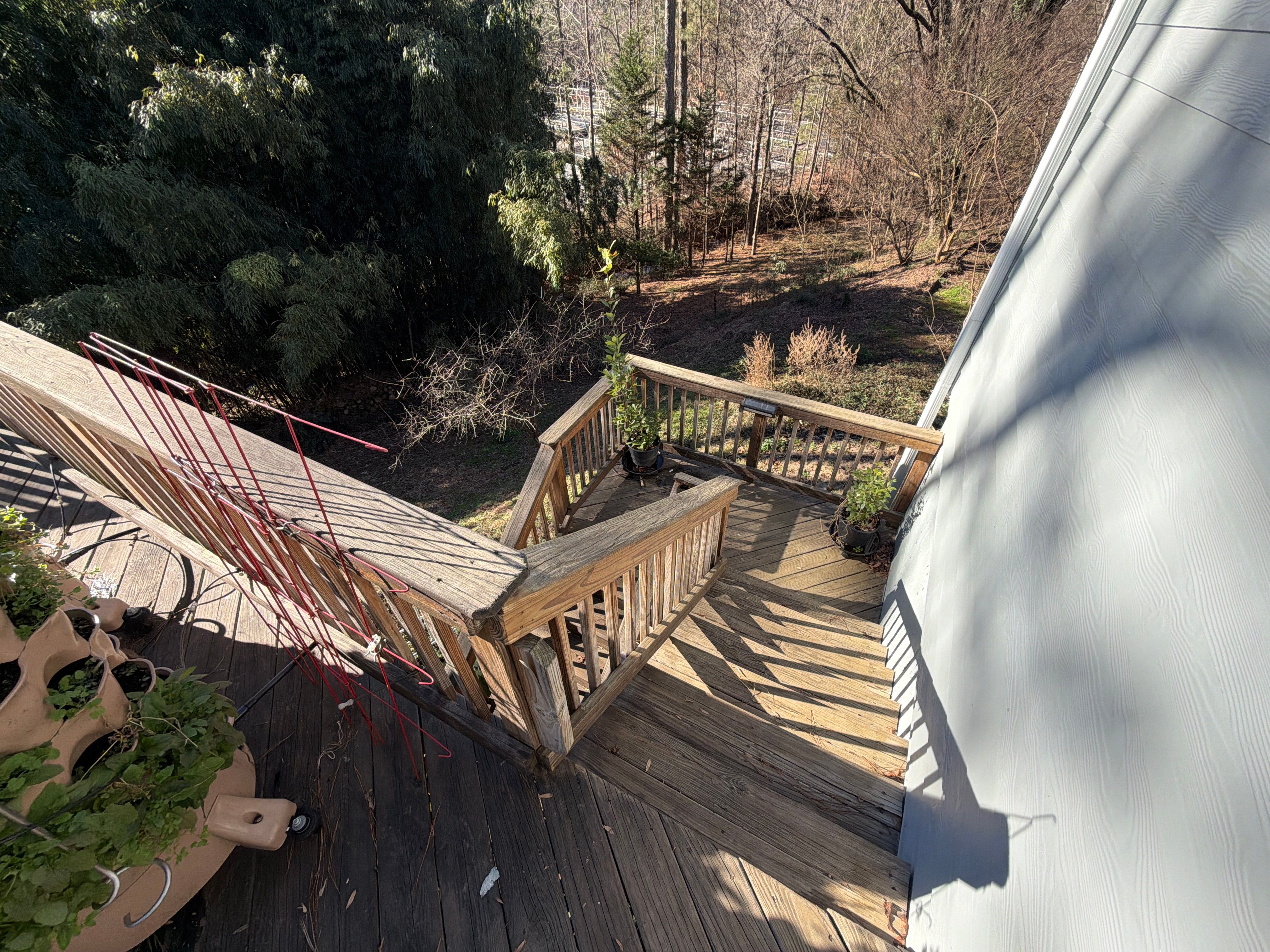 Covered Porch and Deck Build using Deckorators Venture Series Decking and Trex Select Aluminum Railing by Nelson Exteriors