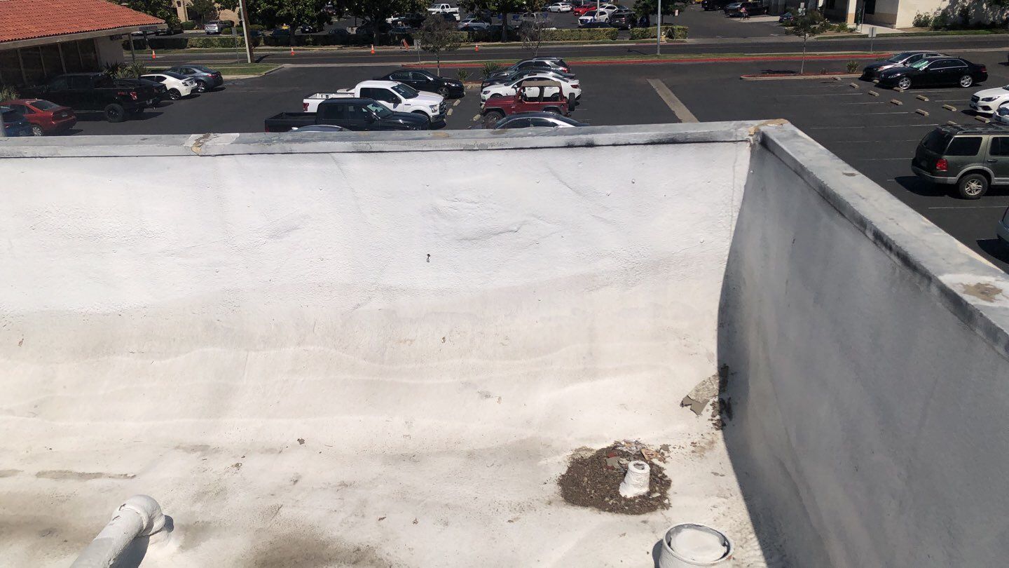 Reburbish existing spray foam job by Straight Edge Roofing Inc