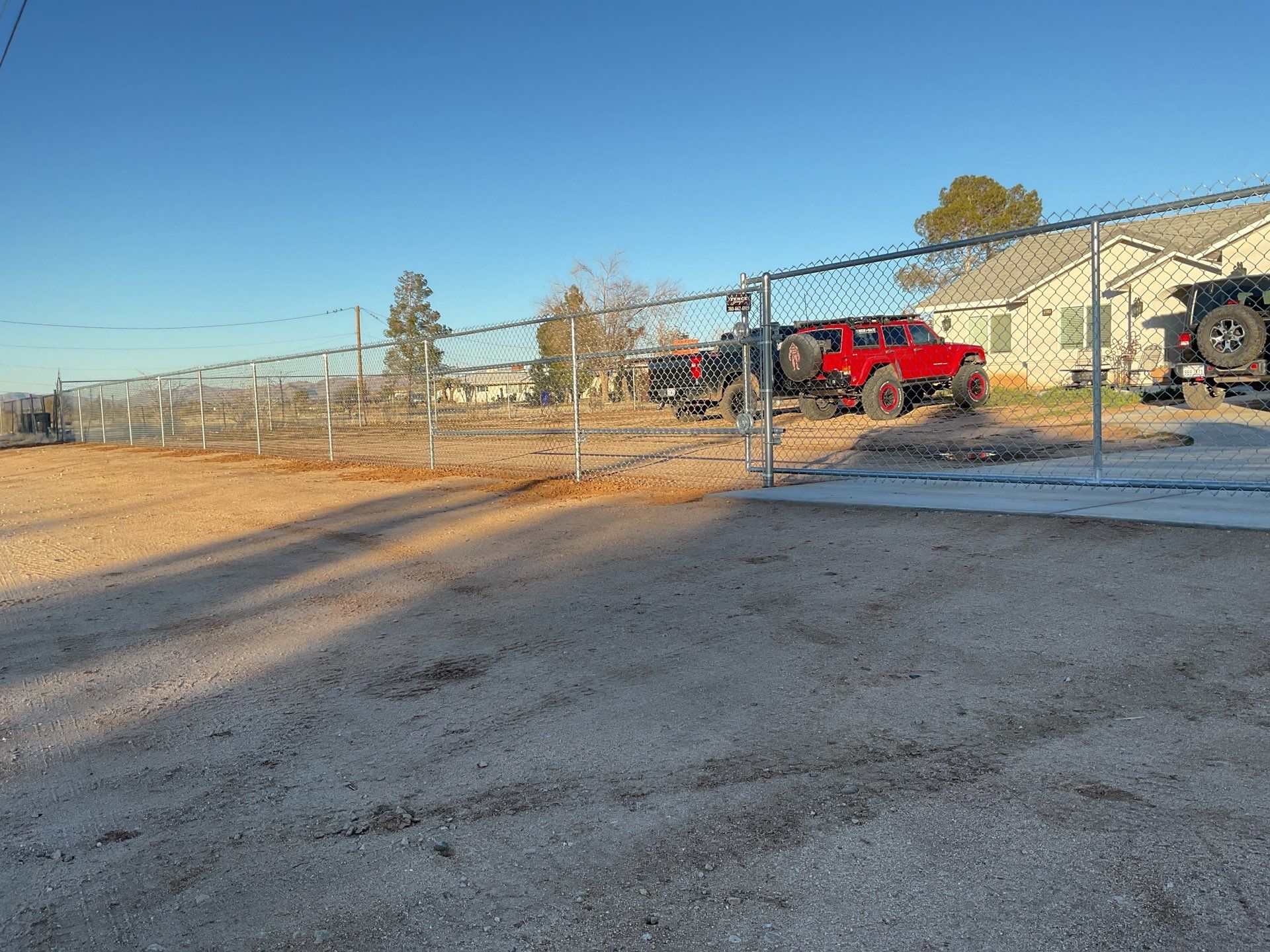 6ft and 5 ft chain link by Fence Guys Inc. 