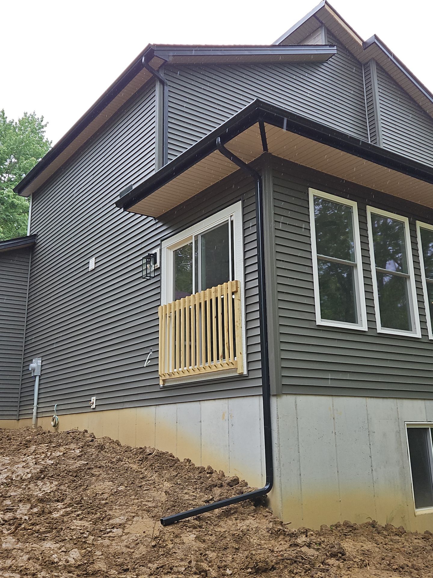 Gutter Installation using 5" Seamless Gutters and Downspouts by RoofX 