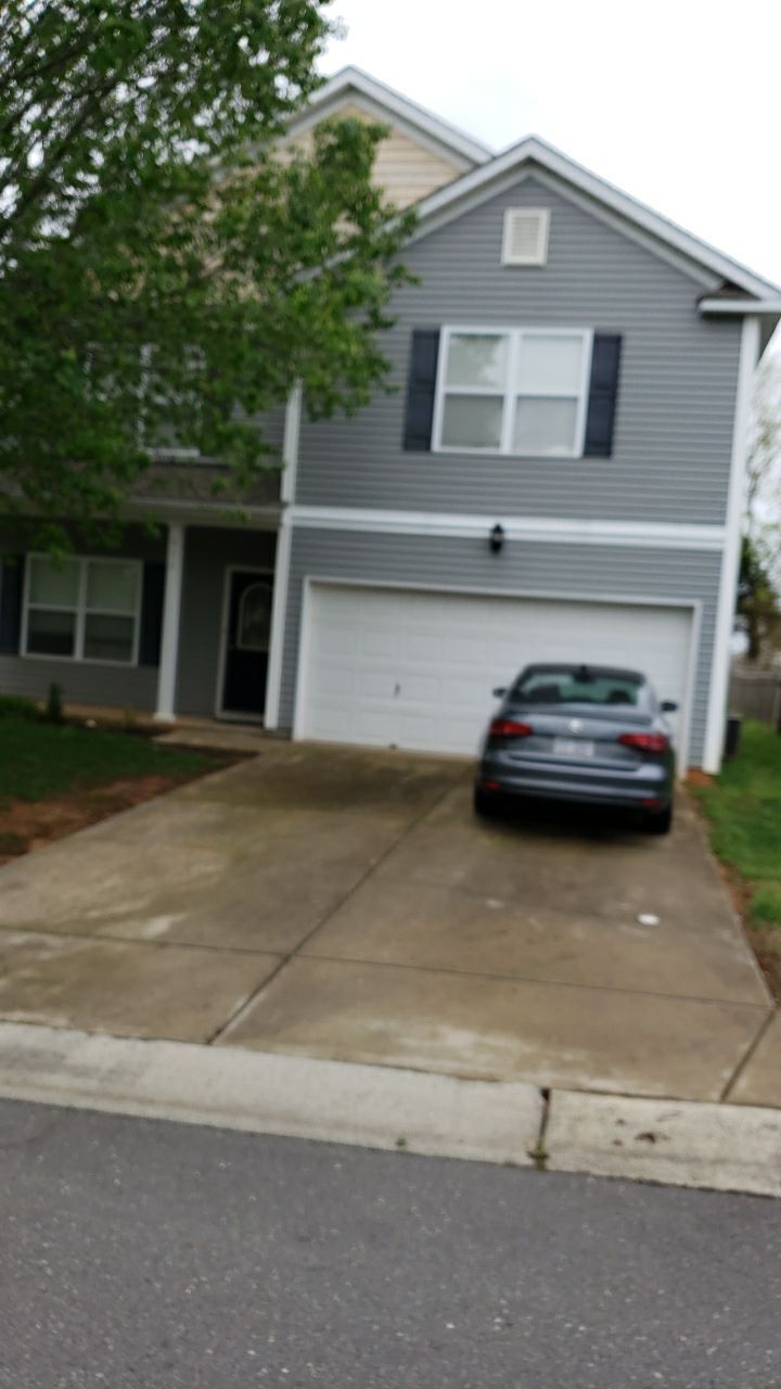 House Wash using cleaner by Power Wash Masters LLC