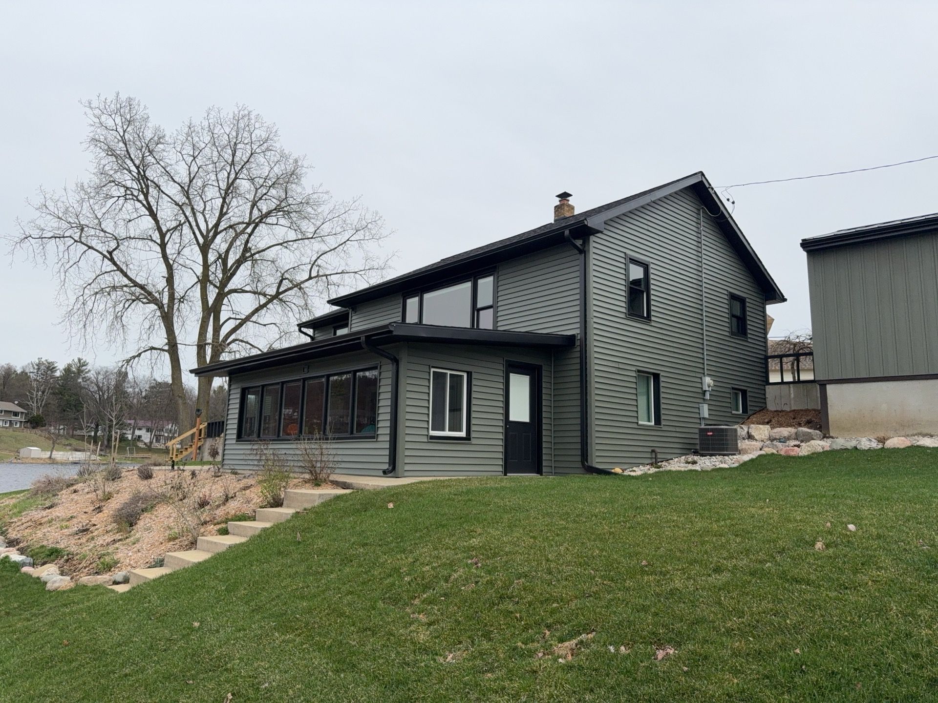 ROOF, SIDING AND SOFFIT INSTALLATION by Avalon Roofing and Exteriors