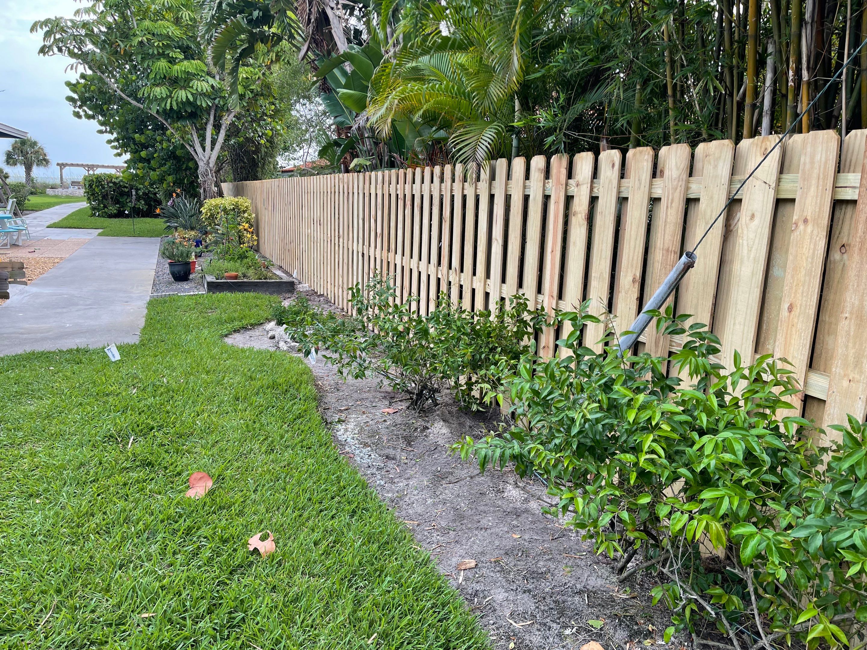 Longboat Key, FL 6 ft. Tall Entry Gates & Shadowbox Wood Fence by Asap fence and gates, LLC