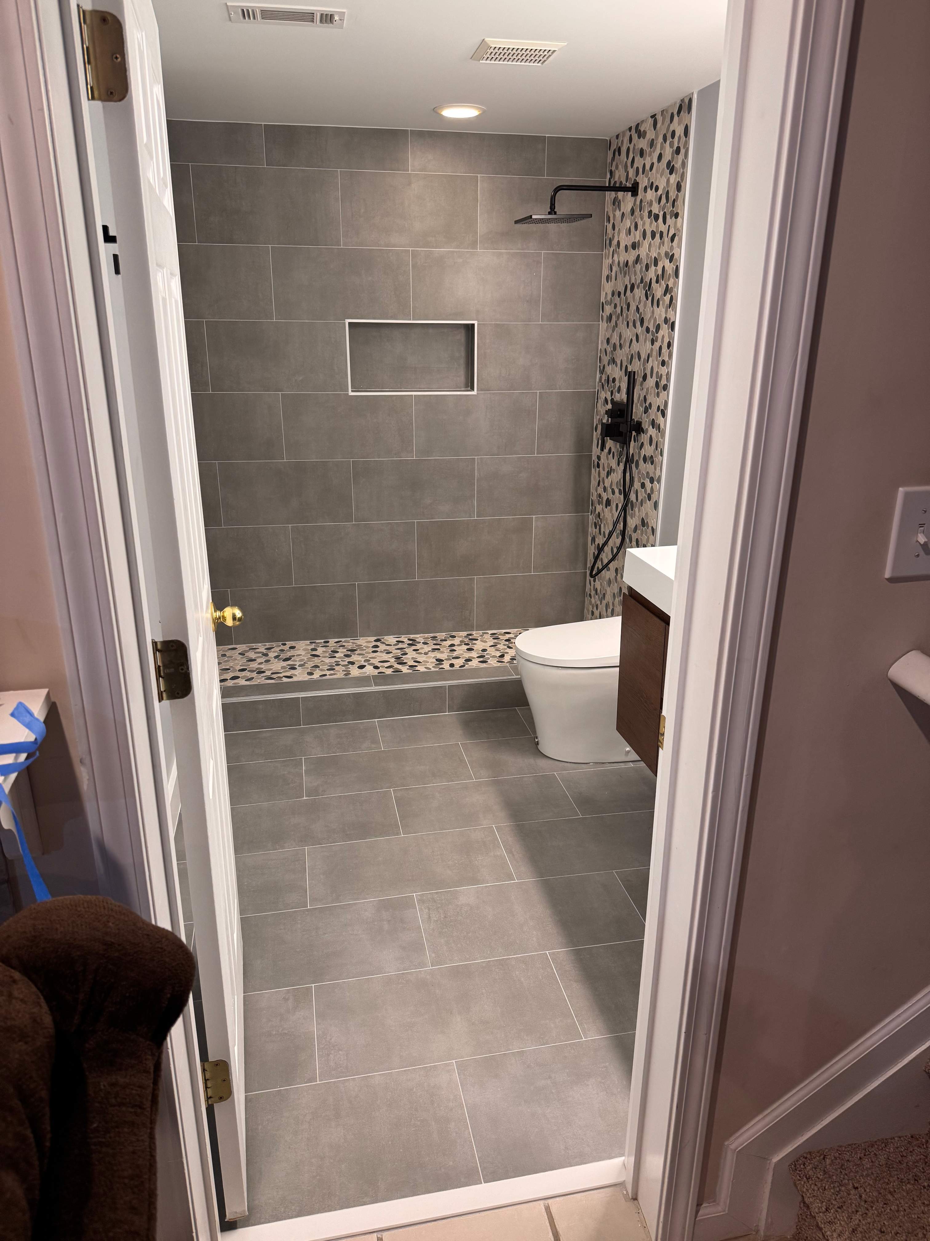Basement bathroom renovation by Prudencio
