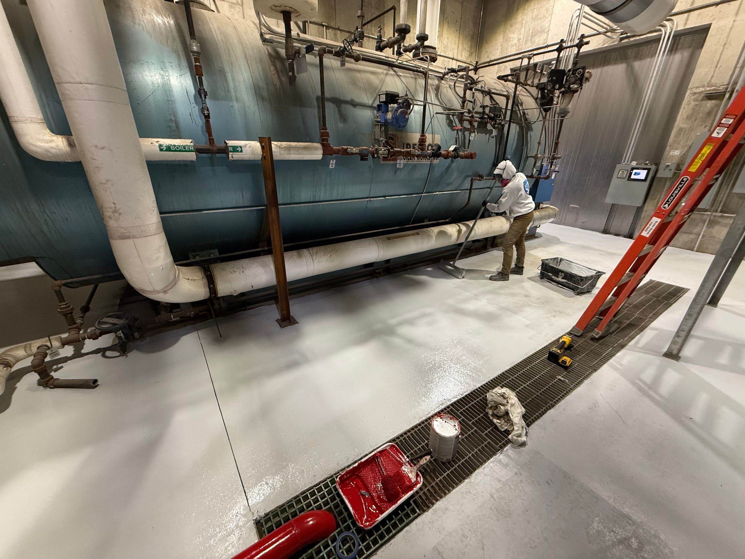 Industrial Epoxy Floor Coating for Perdue Premium Meat Co in Sioux Center by Select Painting, Coatings & Garage Cabinets