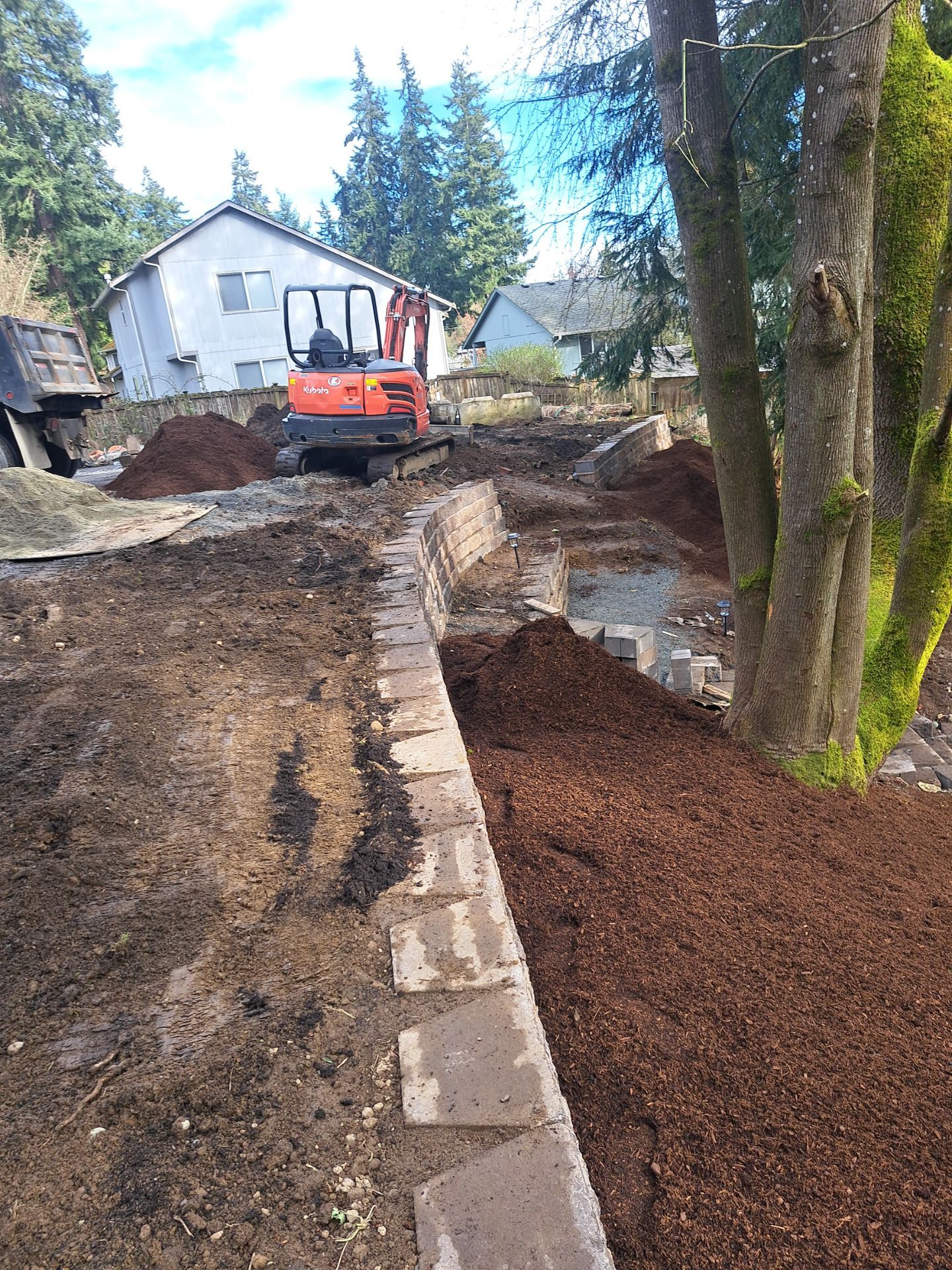 Retaining Wall and Backyard Renovation | Everett  by Jireh Asphalt & Concrete Inc 