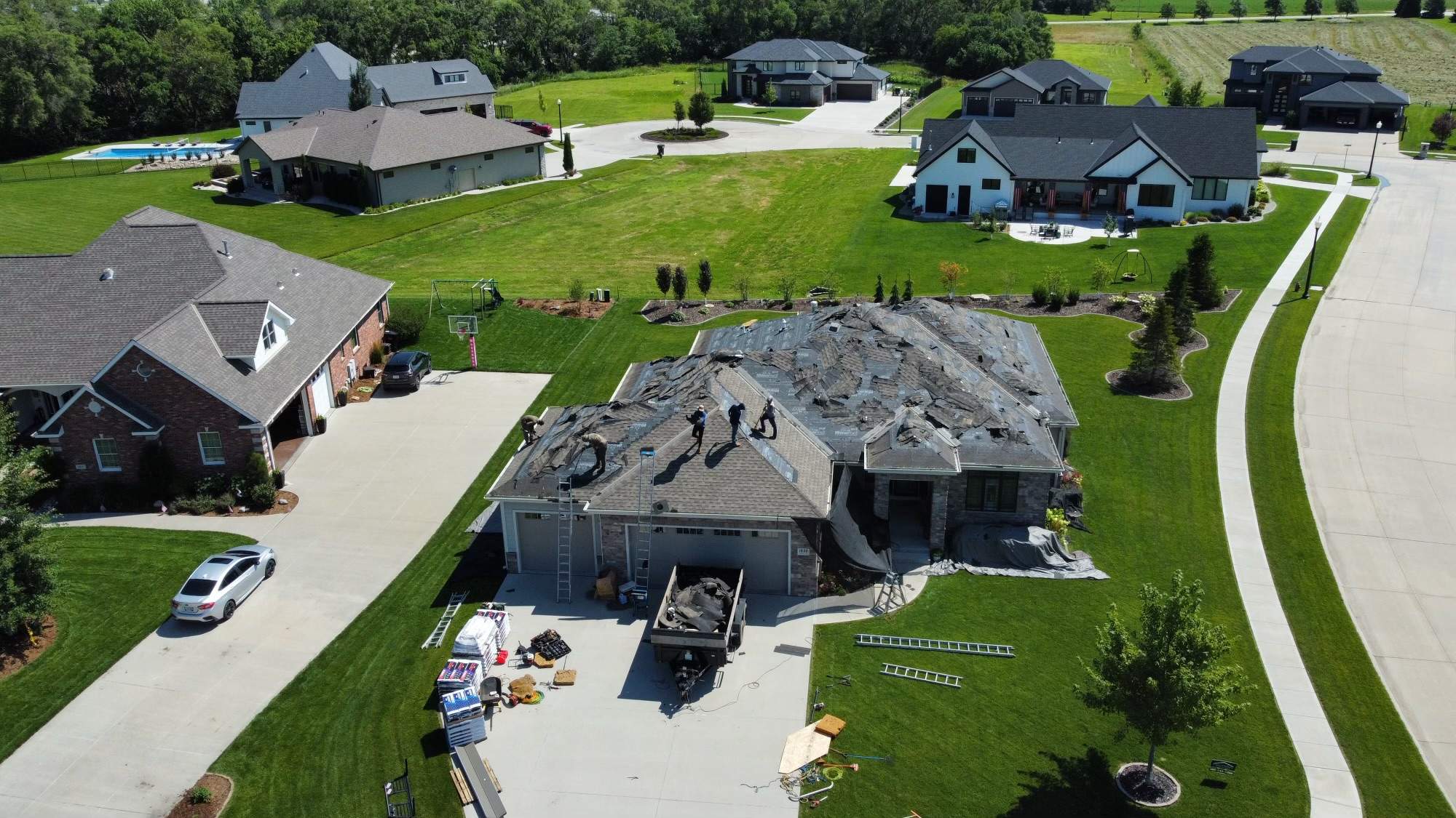 Residential Roofing Installation using TAMKO TITAN WEATHERED WOOD by Lightning Exteriors