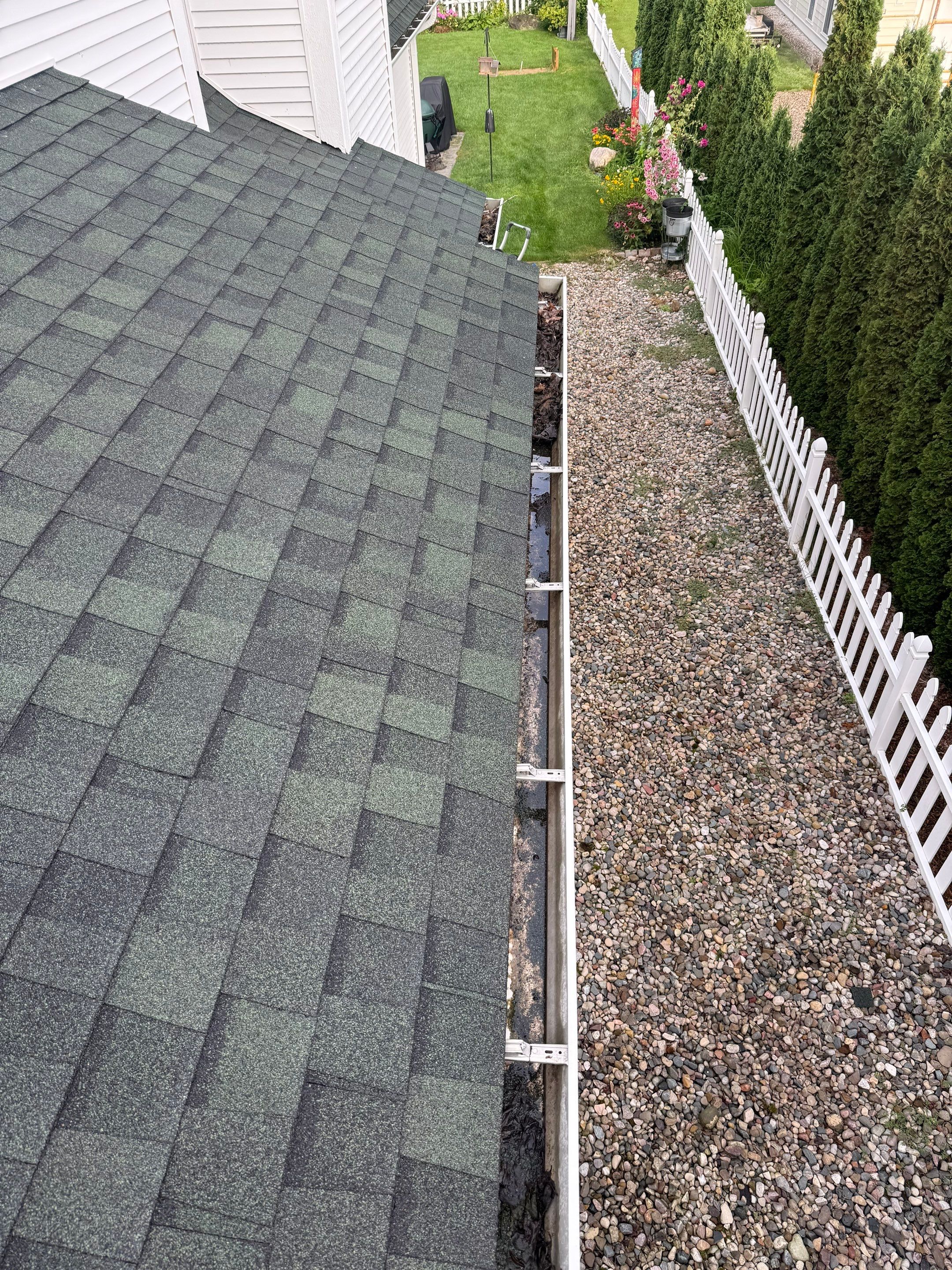 Gutter Helmet Installation for a Traverse City Residential Property by Rainbow Seamless Systems