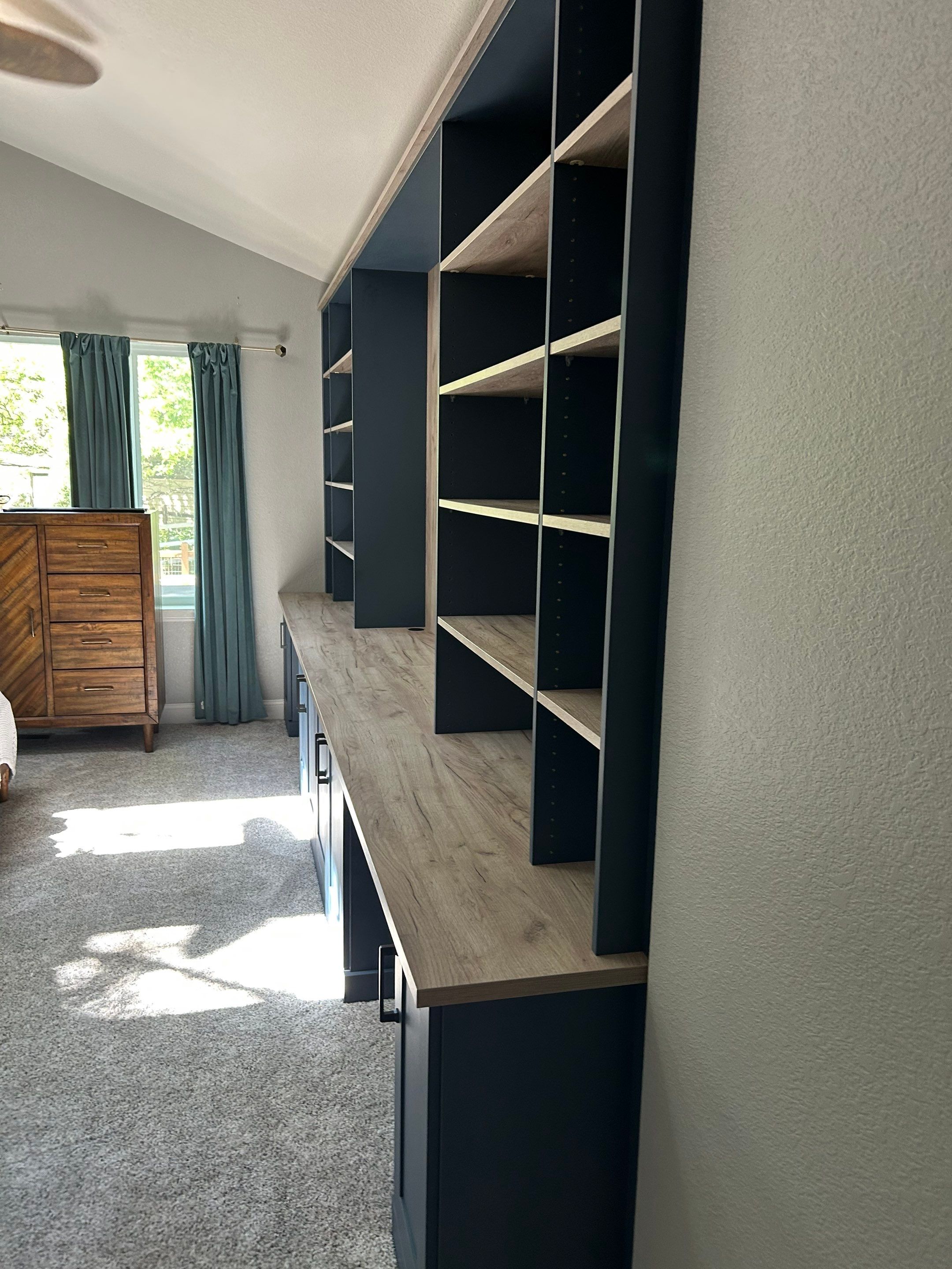 Custom Built-In and Primary Closet in Longmont by Concept 32, Inc.