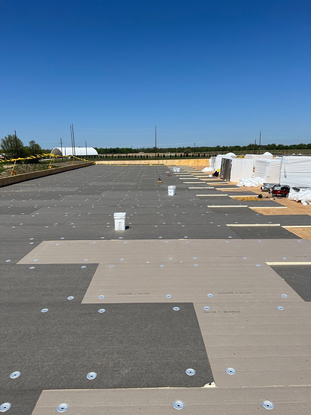 Commercial Roofing Installation using 60 mil rubber roof  by Nitro Roofing and Construction