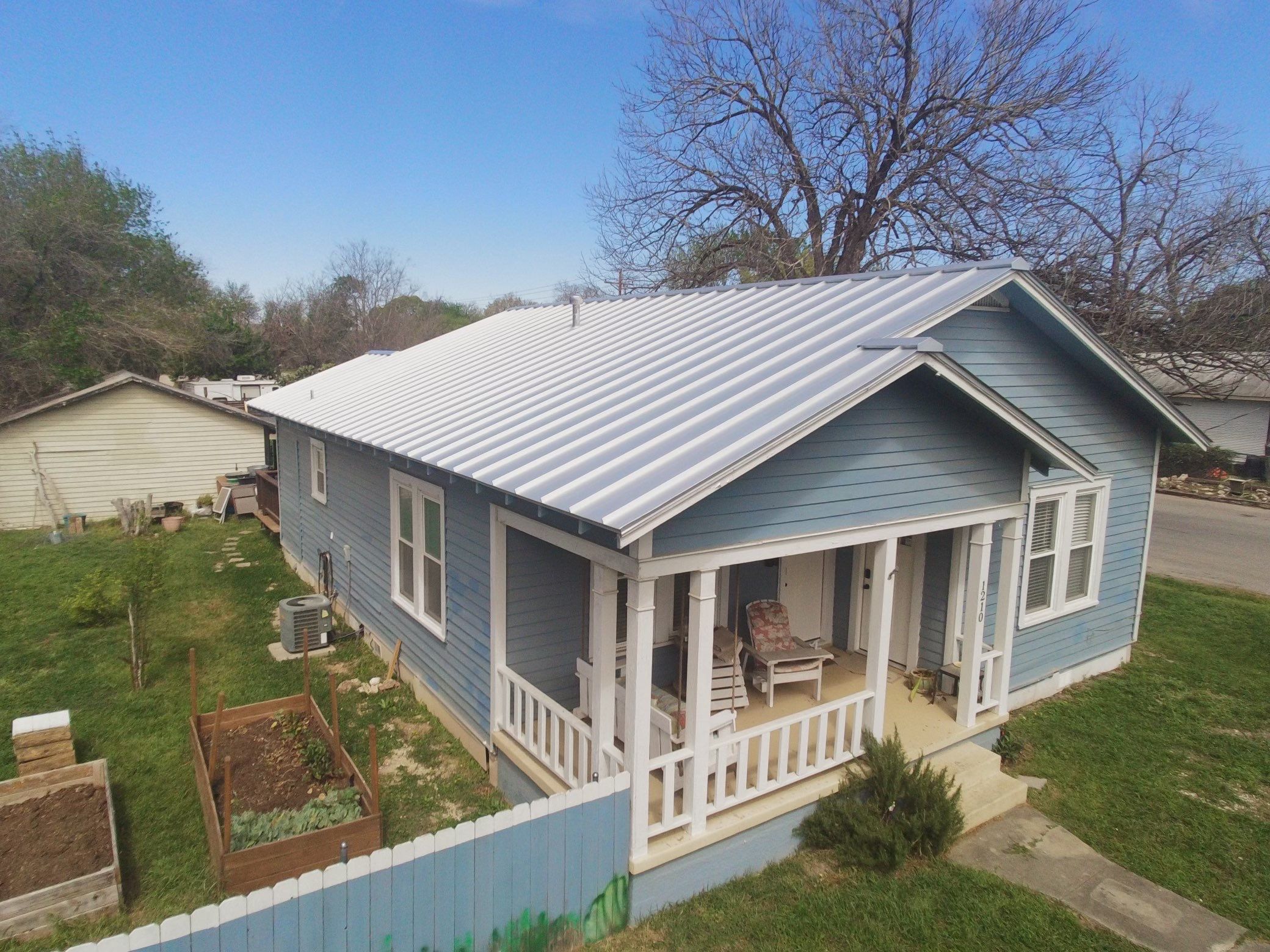 Residential Metal Roof Installation using McElroy Metal by Premier Roofing and Contracting