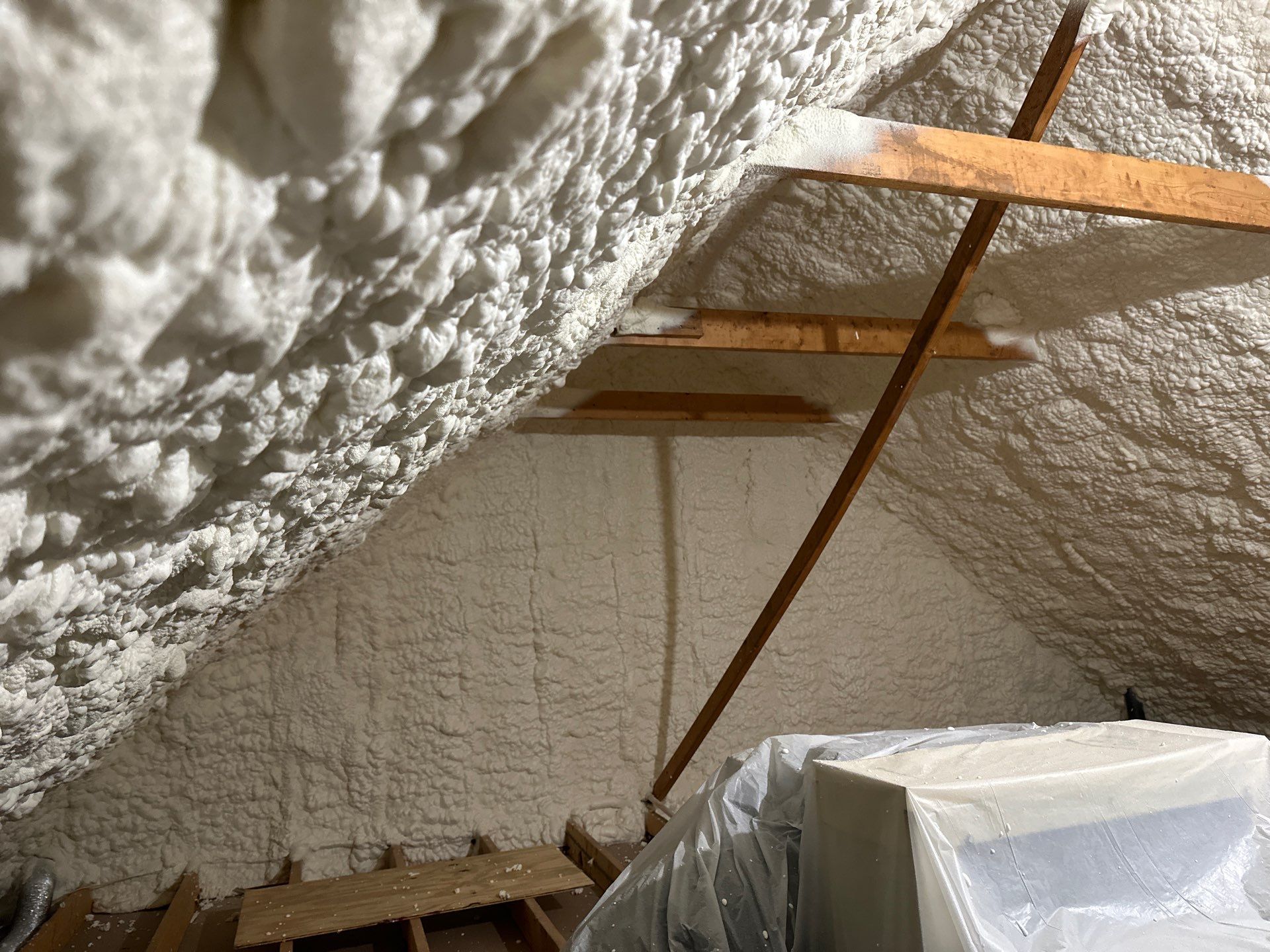 Attic Insulation using open cell spray foam by NYS Foam & Energy