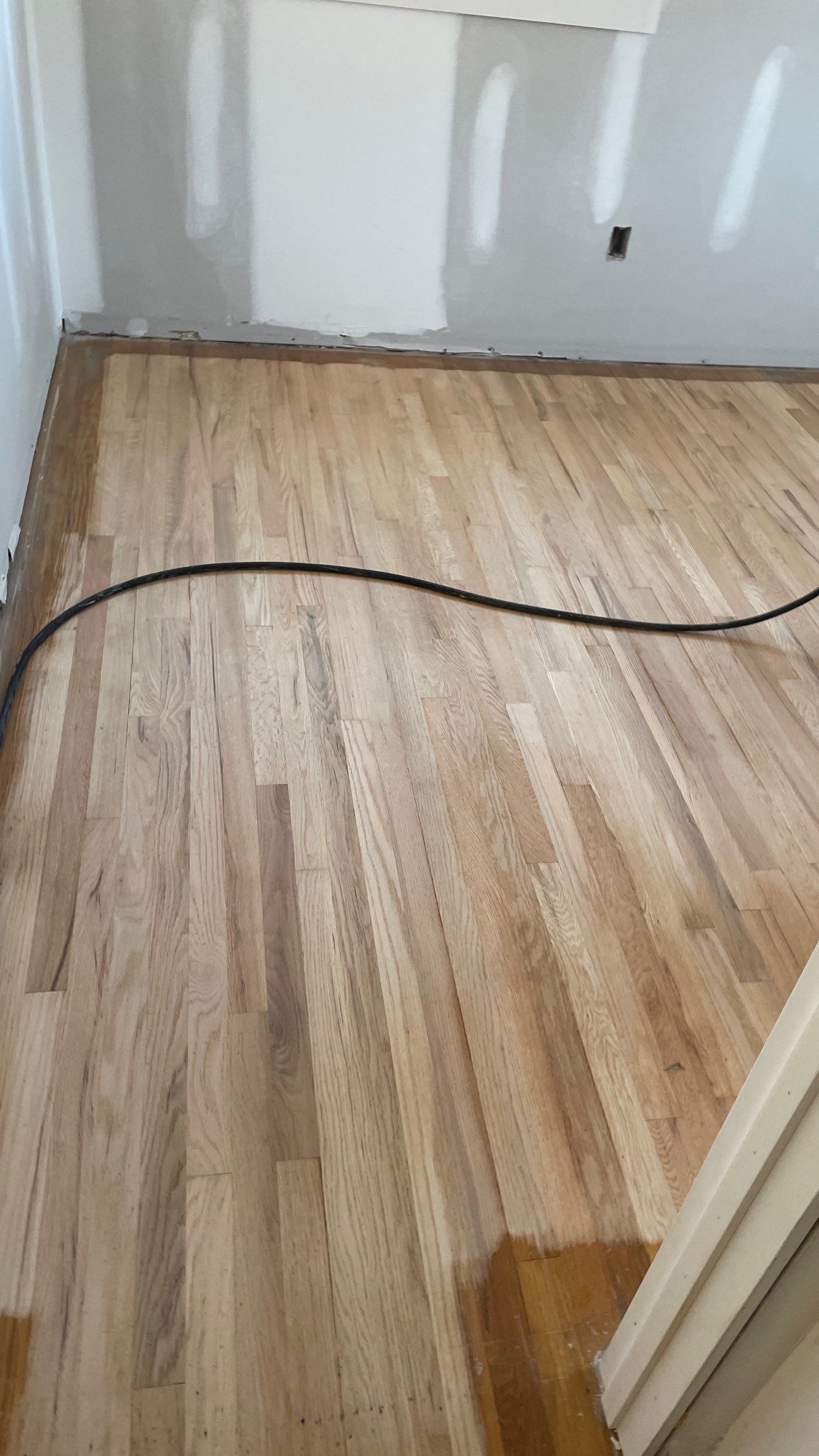 Remodeled Home with new tile floors, Showers and Refinished Oak Floors with stain and Waterbased Finish by Footprints Floors of Coastal Carolina