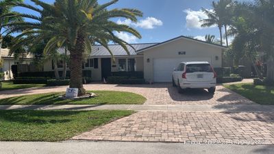 Residential Roofing Installation using 1" Nail strip metal roof