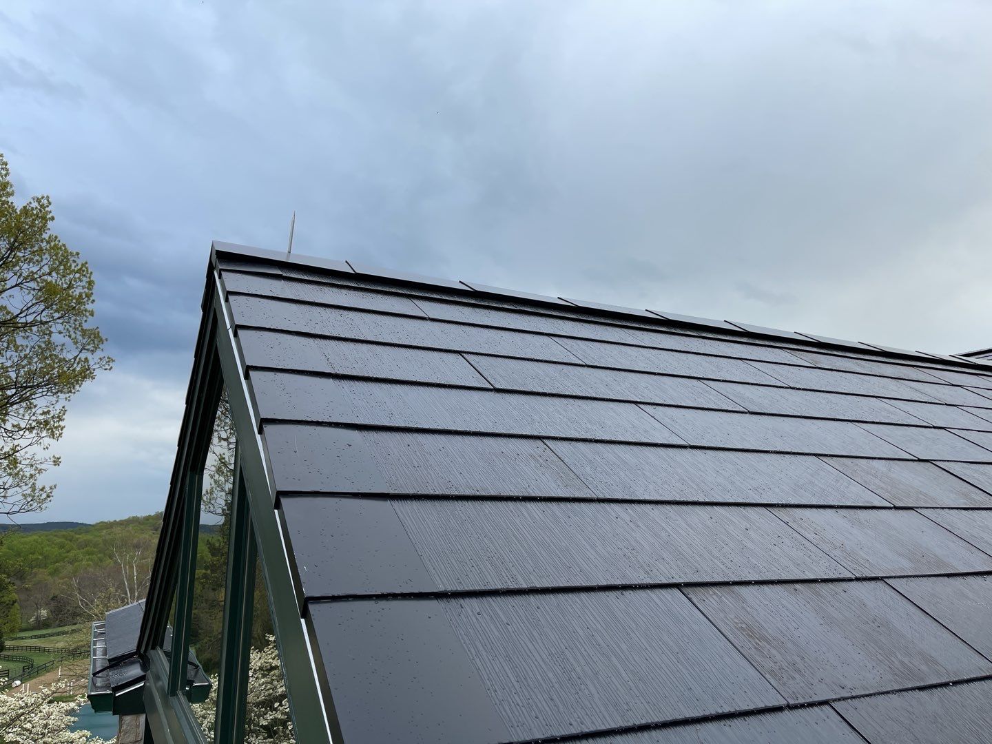 Tesla Solar Roof Replacement by American Home Contractors