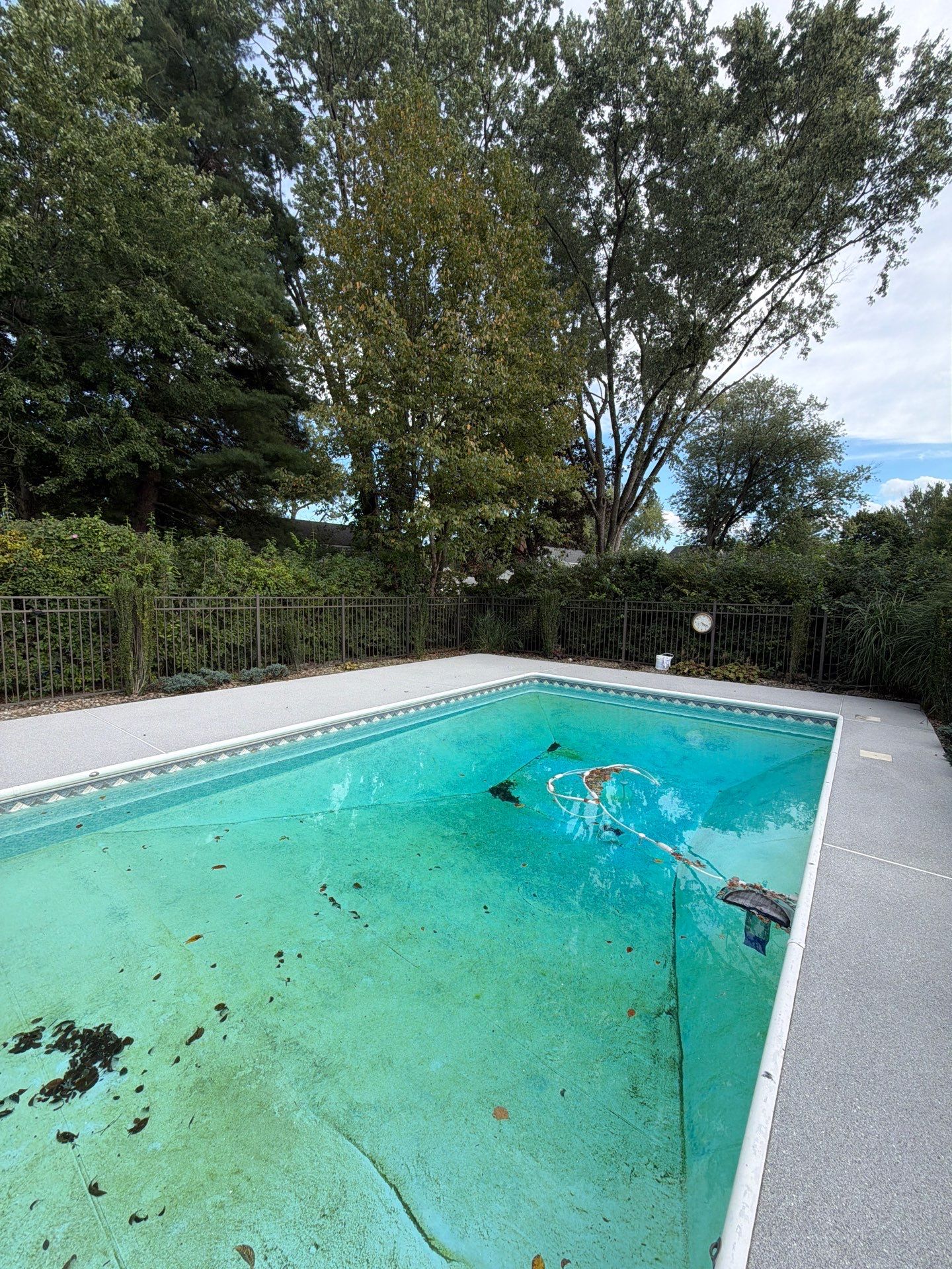 Blue Granite Pool Patio Concrete Coating in Lincoln Park by Spectrum Painting, LLC