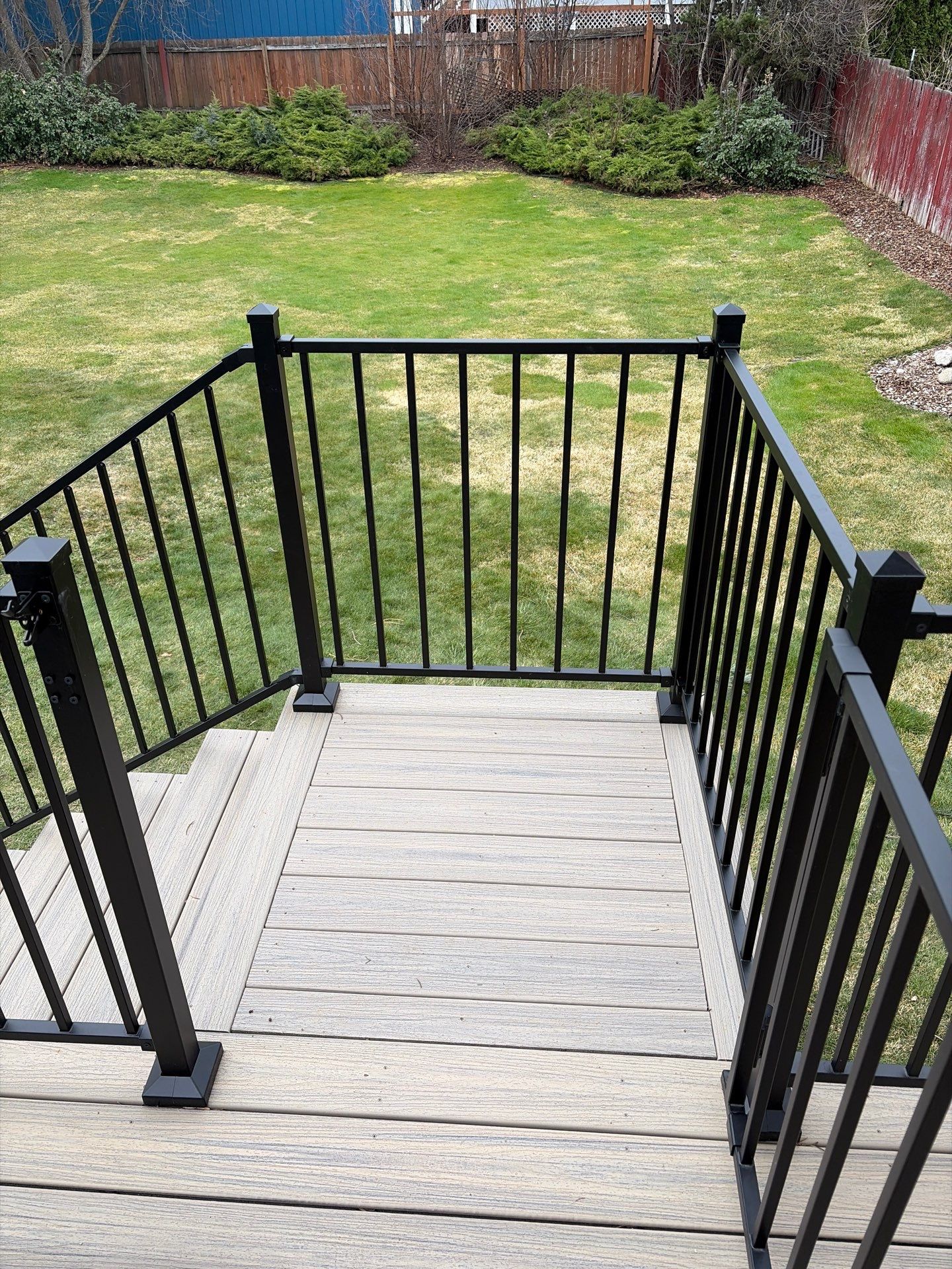 Add a platform deck below an existing elevated deck that was there prior by Home Helpers General Contracting