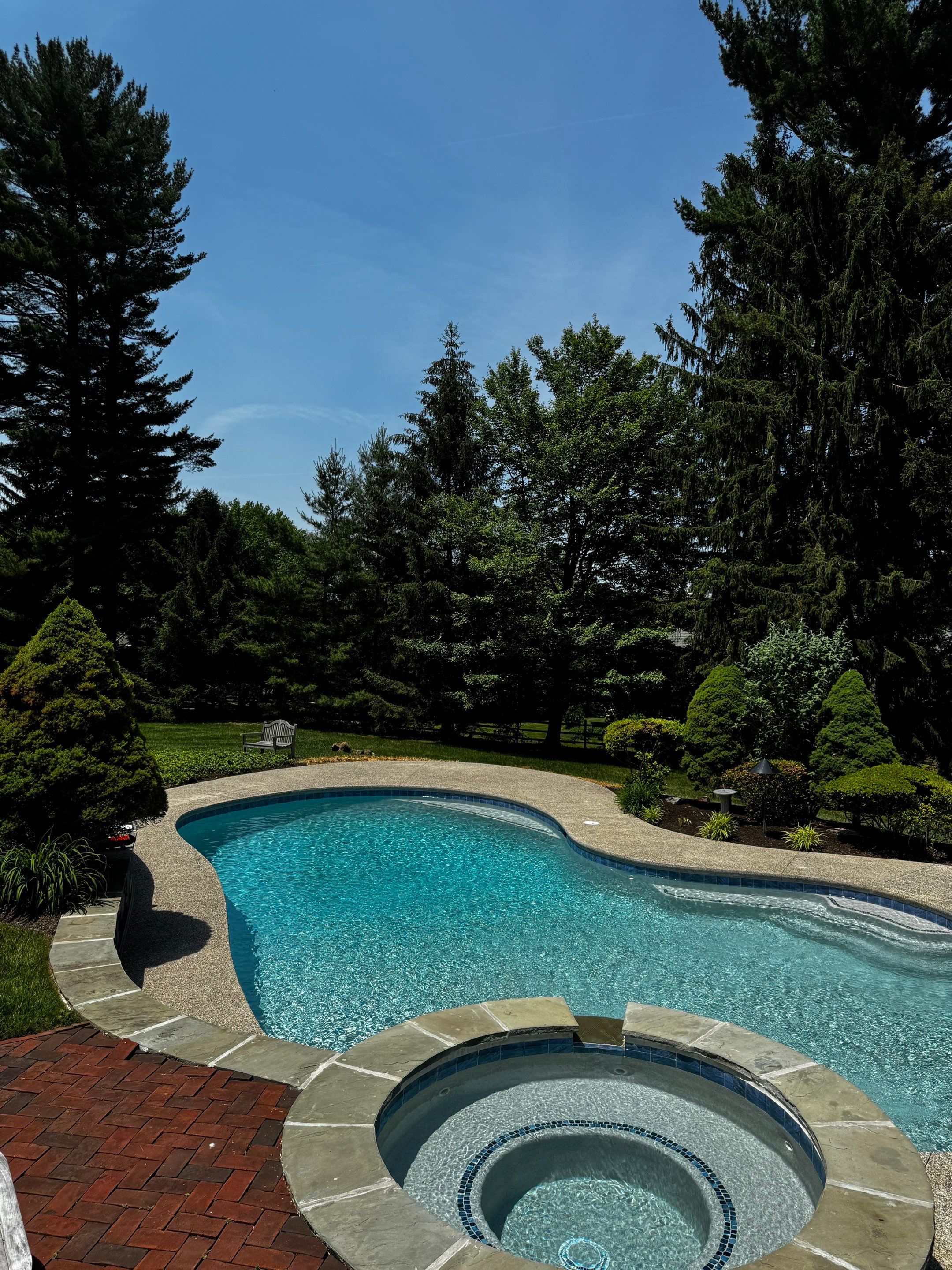 Exposed Aggregate Pool Deck Renovation in Villanova by Architectural Concrete Design