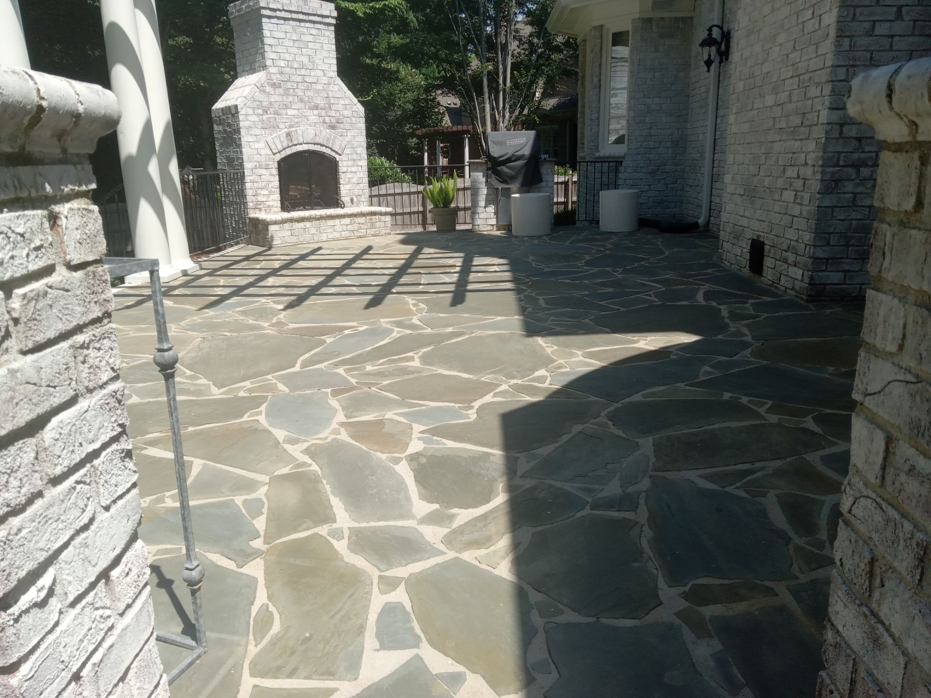 pressure washing flagstone patio surface cleaning dirt grime for refreshed outdoor area