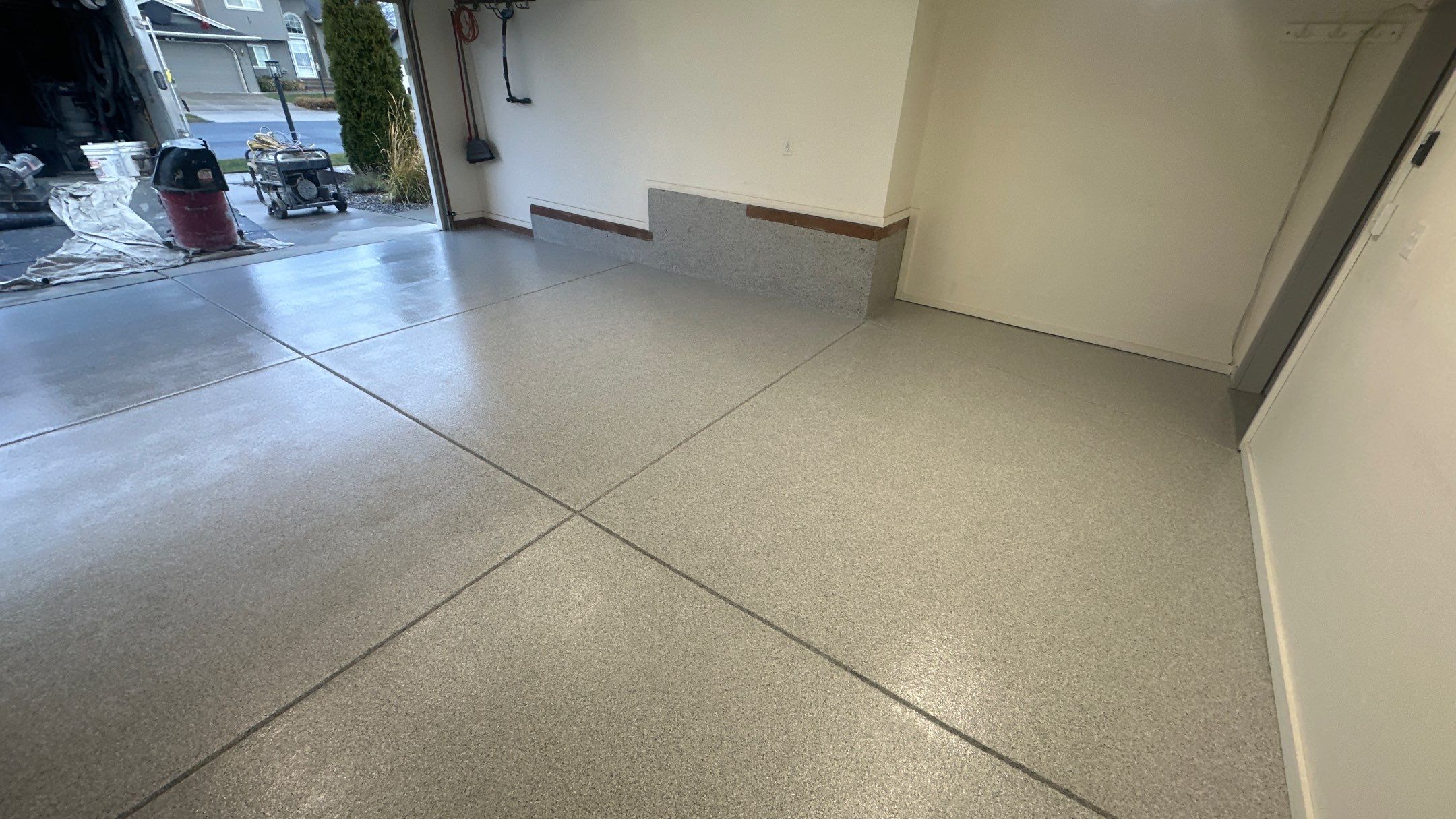 Garage Transformation using 1/8 Tidal Wave by Croc Coatings, LLC
