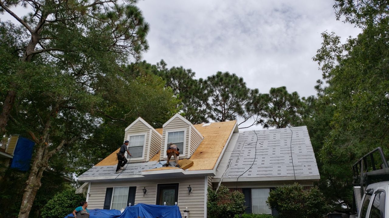 Residential Roofing Installation using Roof Replacement by American Roofing & Construction LLC