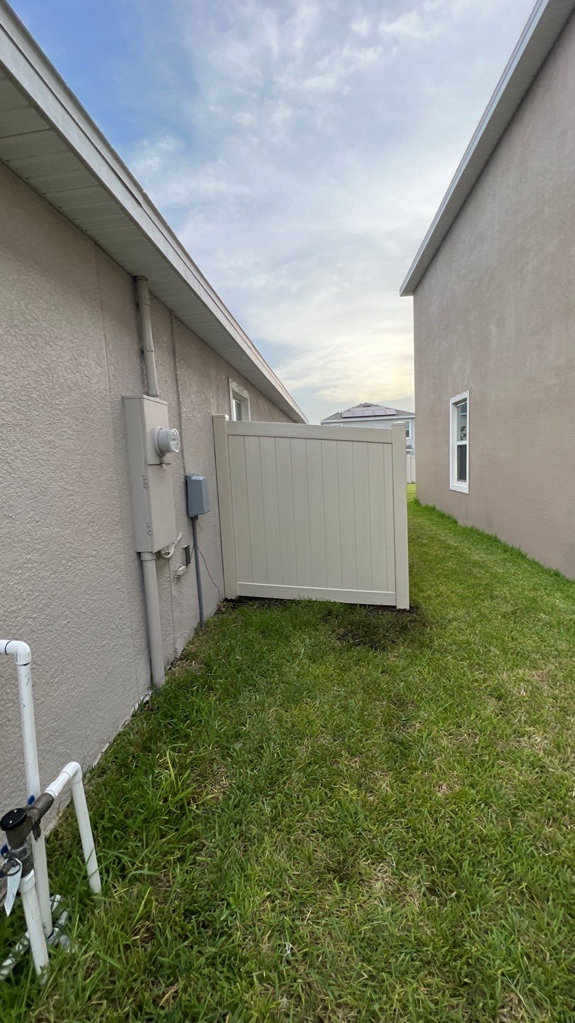 Tan Vinyl Privacy Fence Installation by Asap fence and gates, LLC