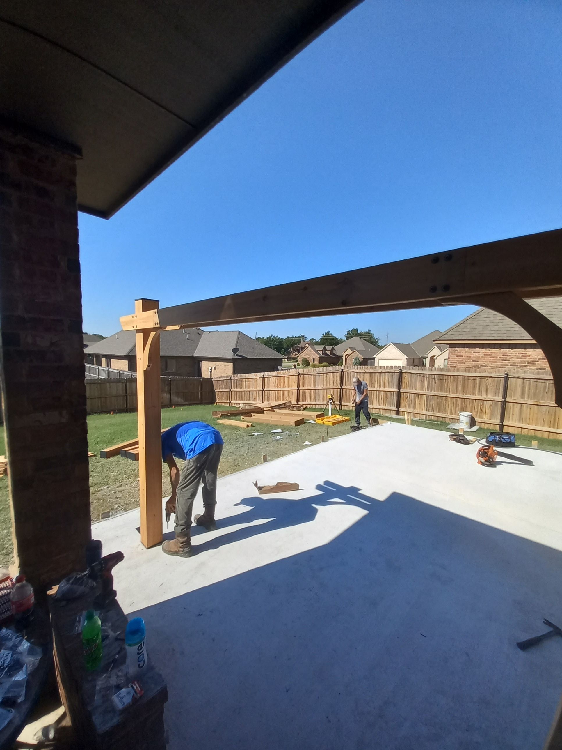 Concrete slab with Pergola by Clays Services Inc