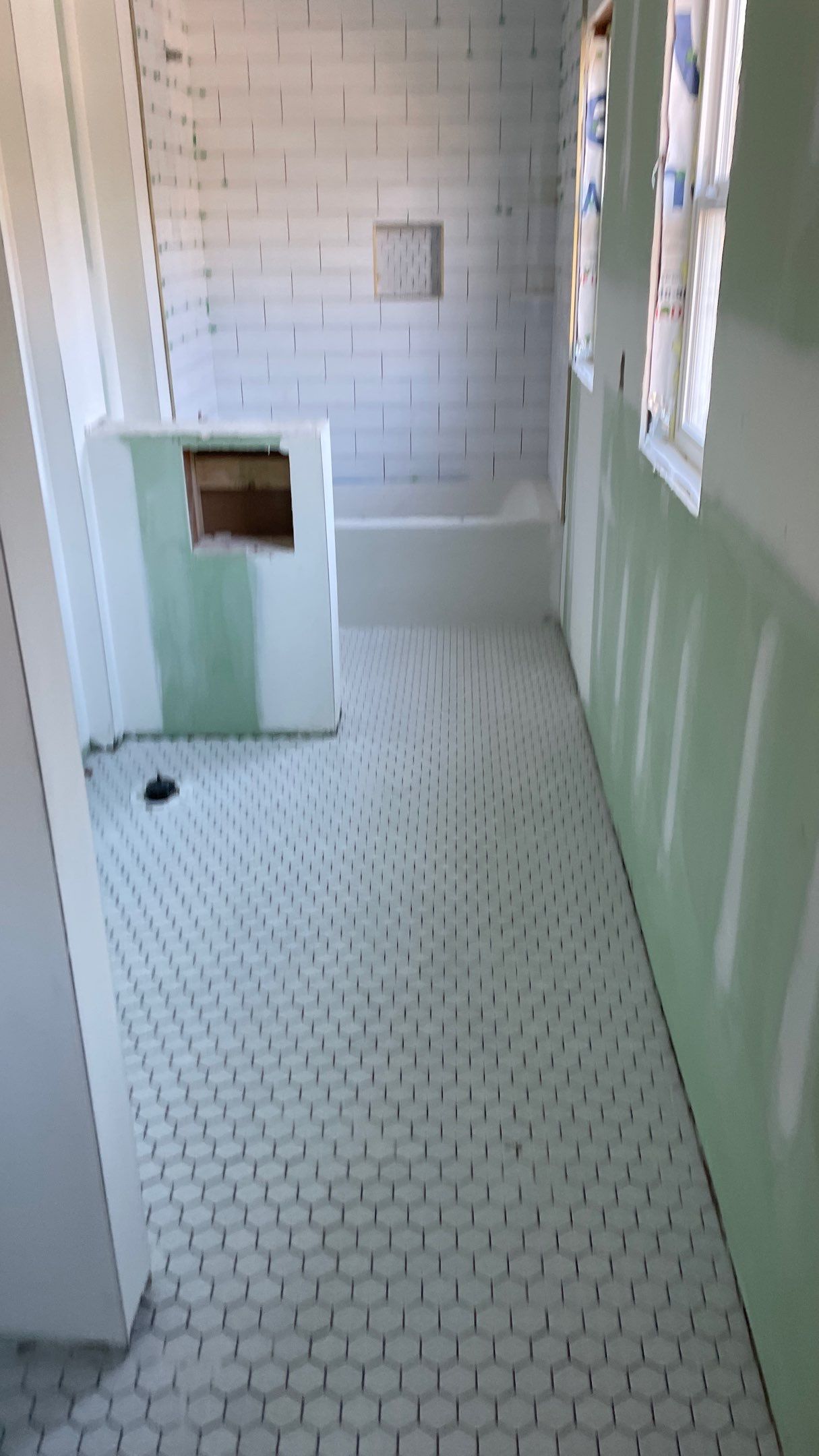 Remodeled Home with new tile floors, Showers and Refinished Oak Floors with stain and Waterbased Finish by Footprints Floors of Coastal Carolina