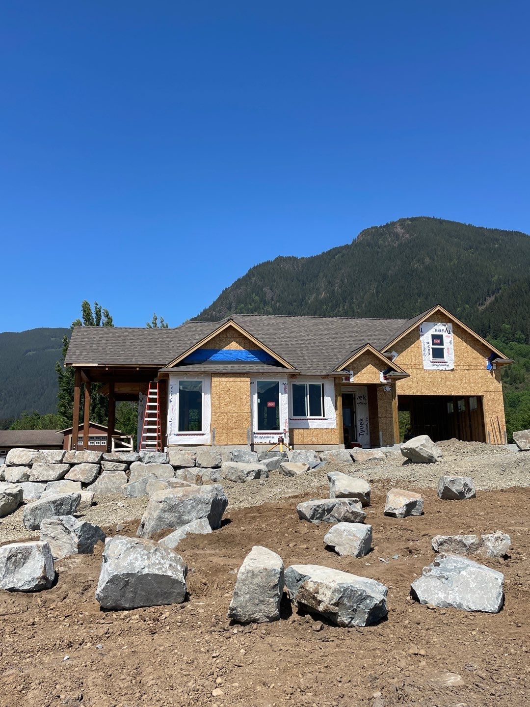 Residential Roofing Installation upgraded venting and hip and ridge capping by Top Notch Roofing Inc