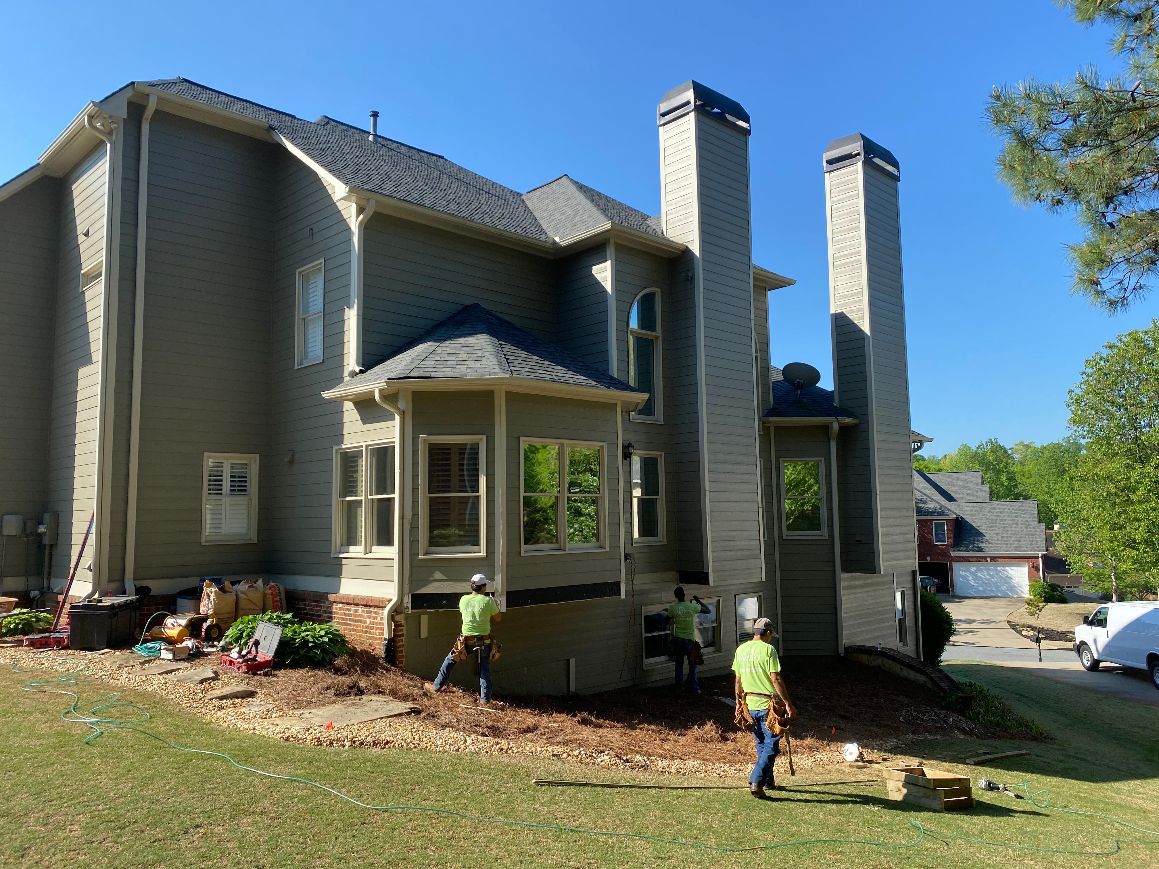 Covered Porch and Composite Deck Addition in Woodstock by Swift Home Renovations