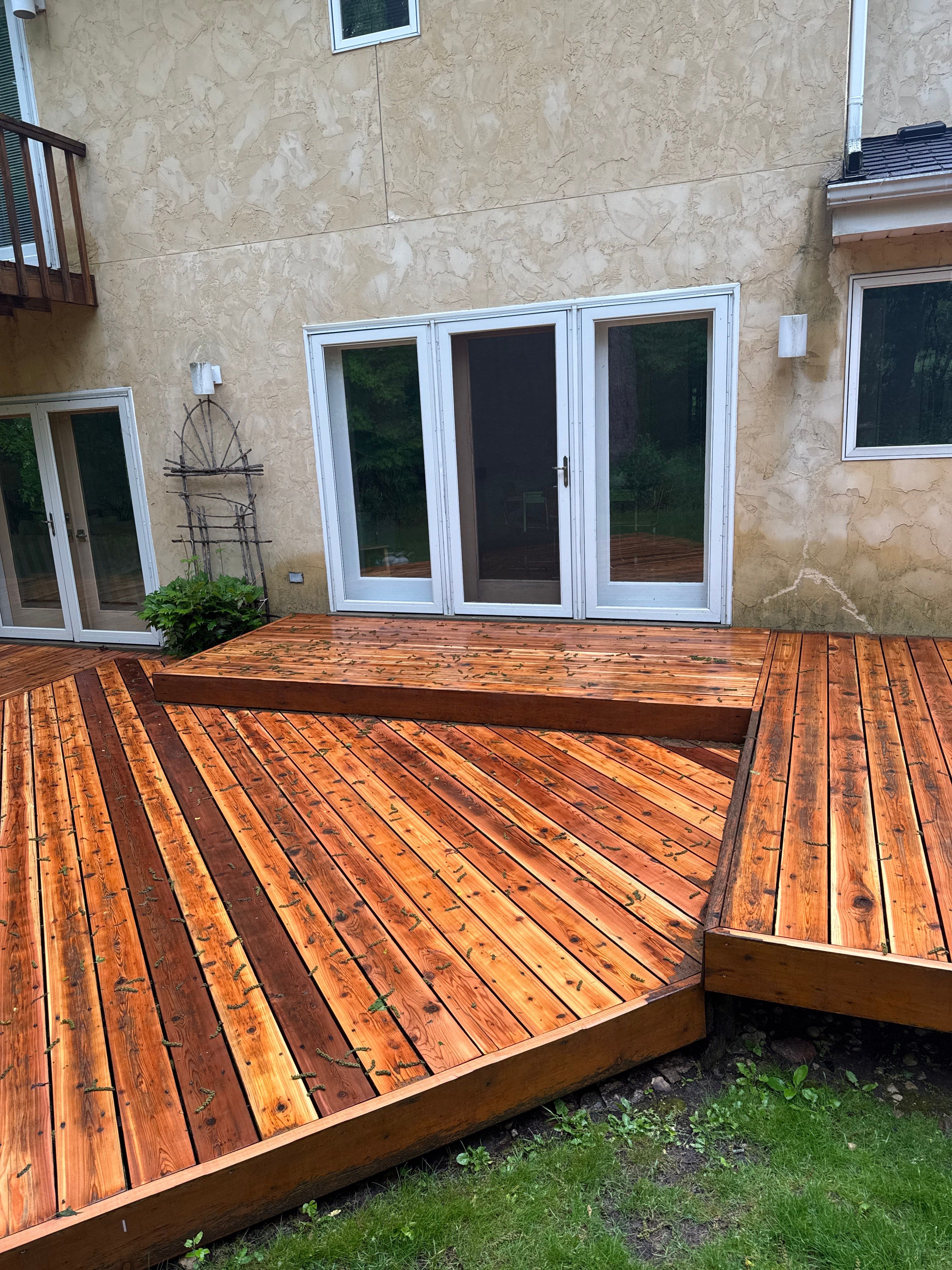 Multi-Level Wood Deck Restoration and Refinishing in Muskego by OCS Contracting Services