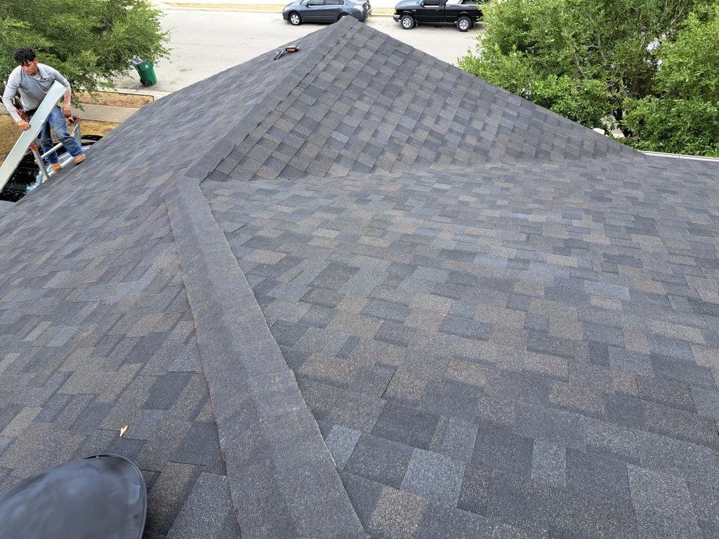 Residential Roofing Replacement and Gutter Installation in Manor by Caliber Restoration LLC