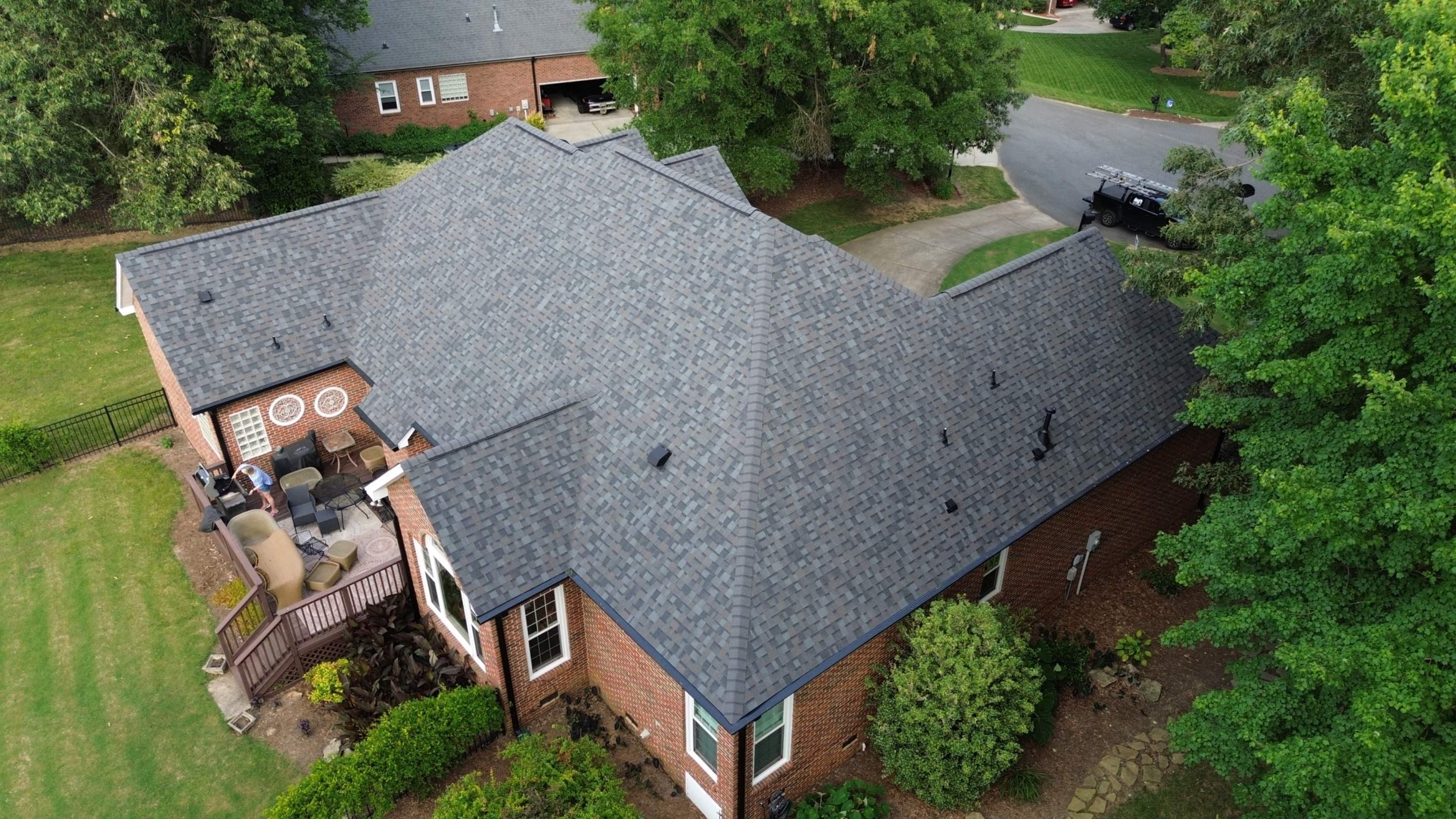Residential Roof Replacement and Seamless Gutter Installation in Wesley Chapel, NC by Merritt Roofing LLC