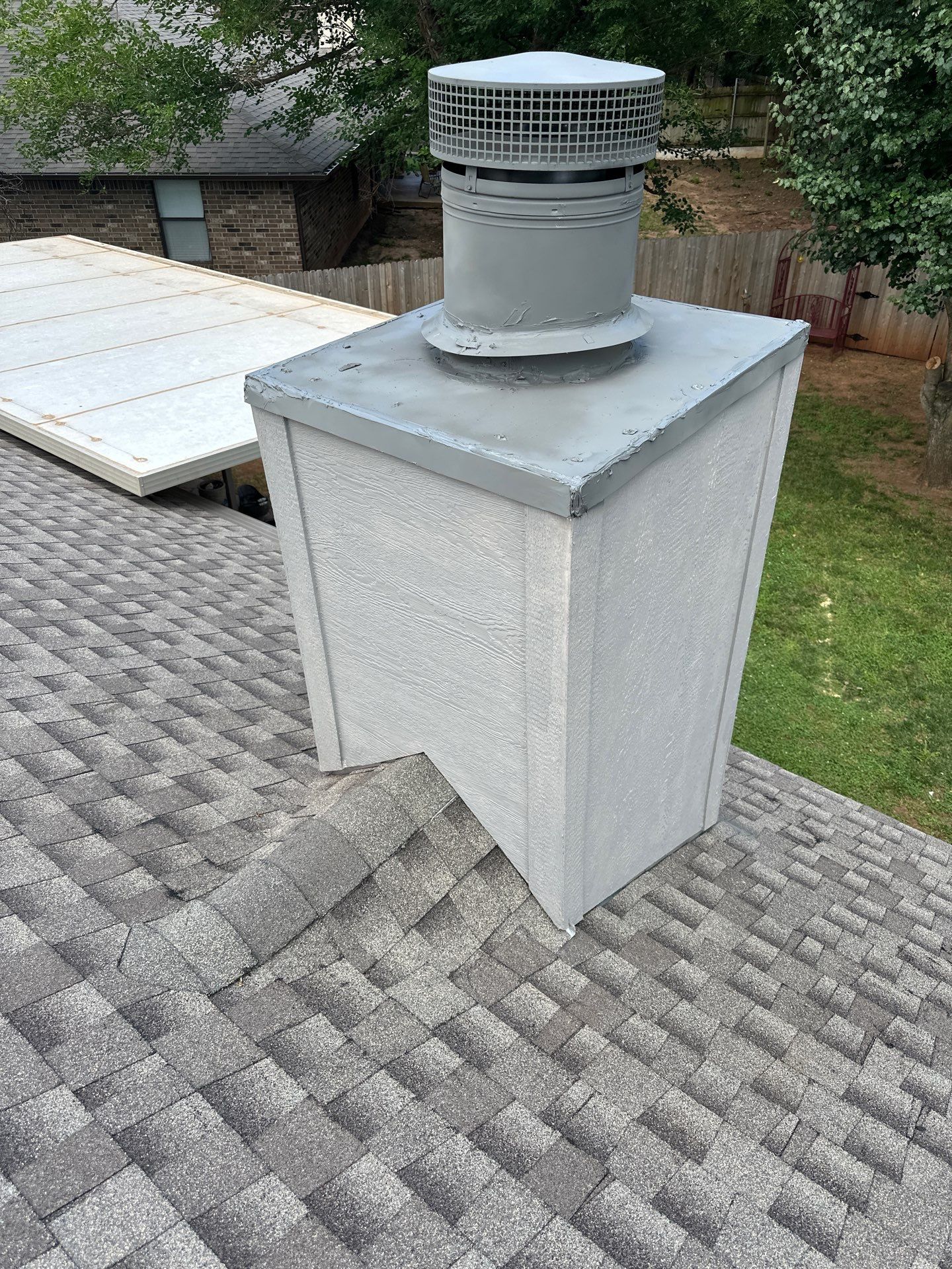 roof, chimney siding, & solar tube replacement in Edmond by McCann's Roofing and Construction