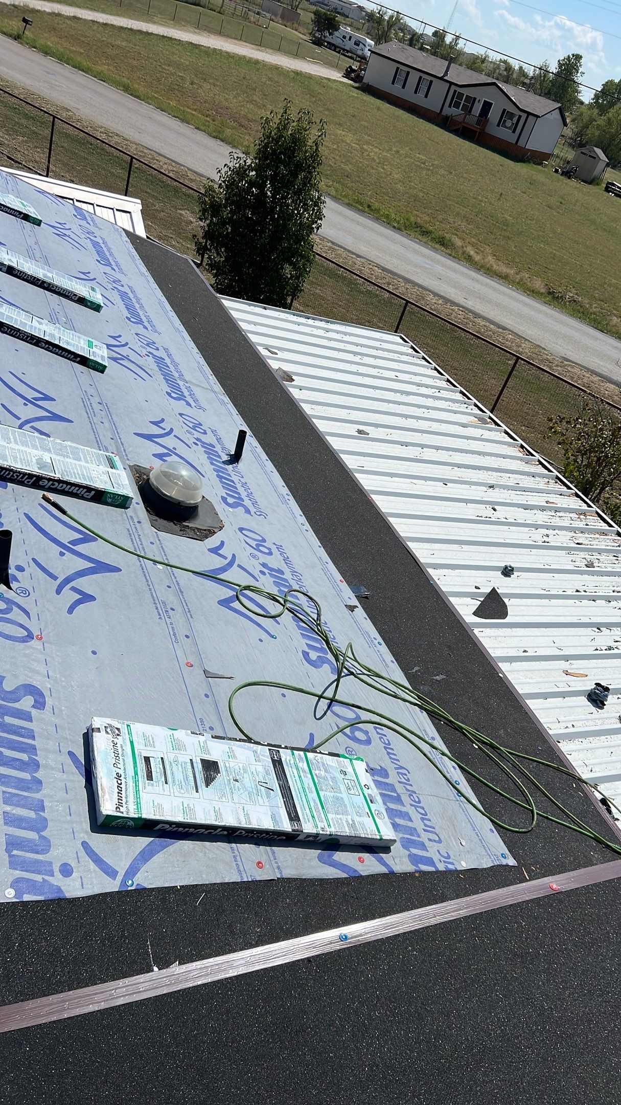 Residential Roofing Installation using ATLAS Pinnacle Pristine Shingles by Harvey Roofing & Construction