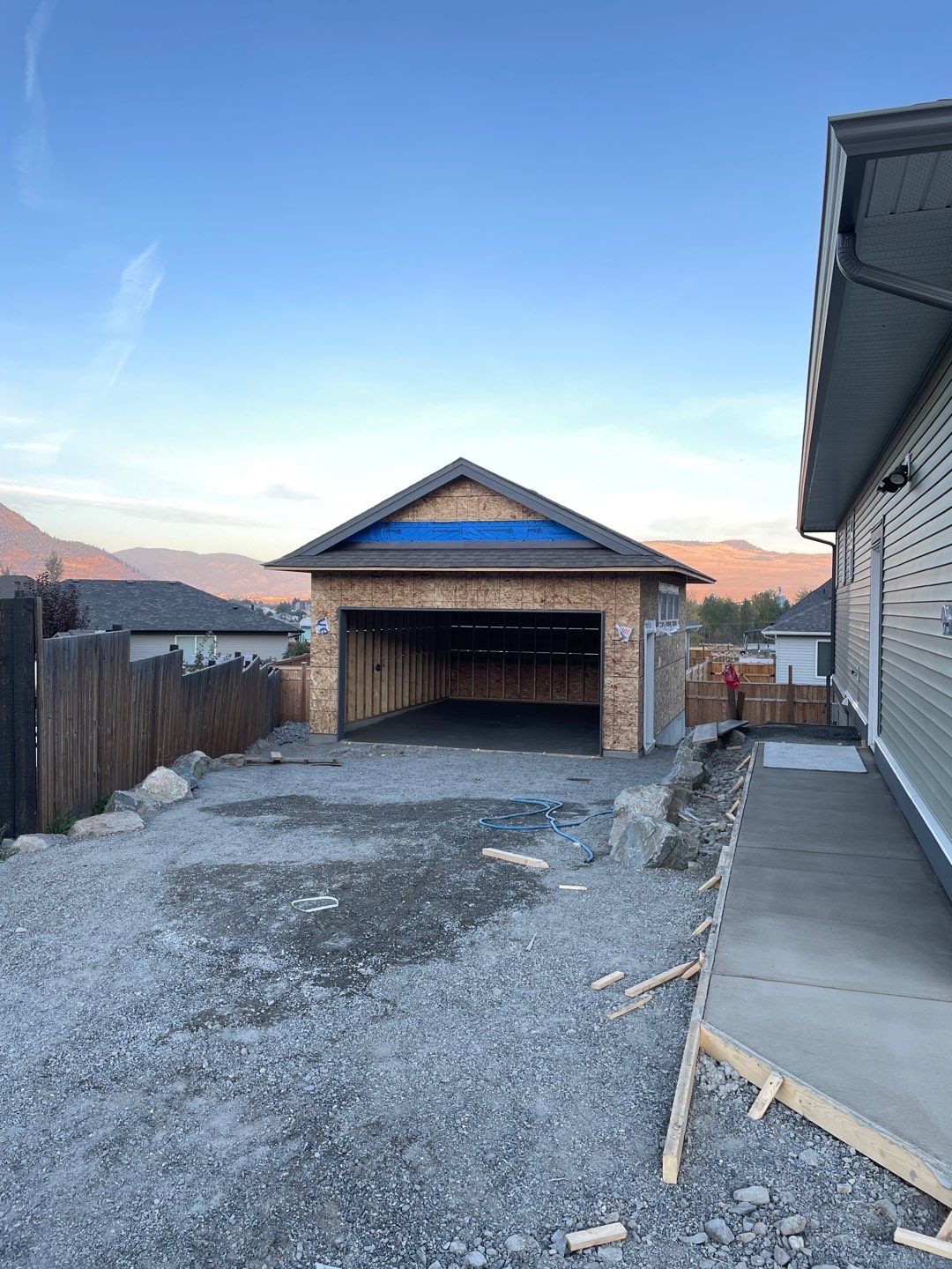 Residential Roofing Installation using IKO Weatherwood shingle by Top Notch Roofing Inc