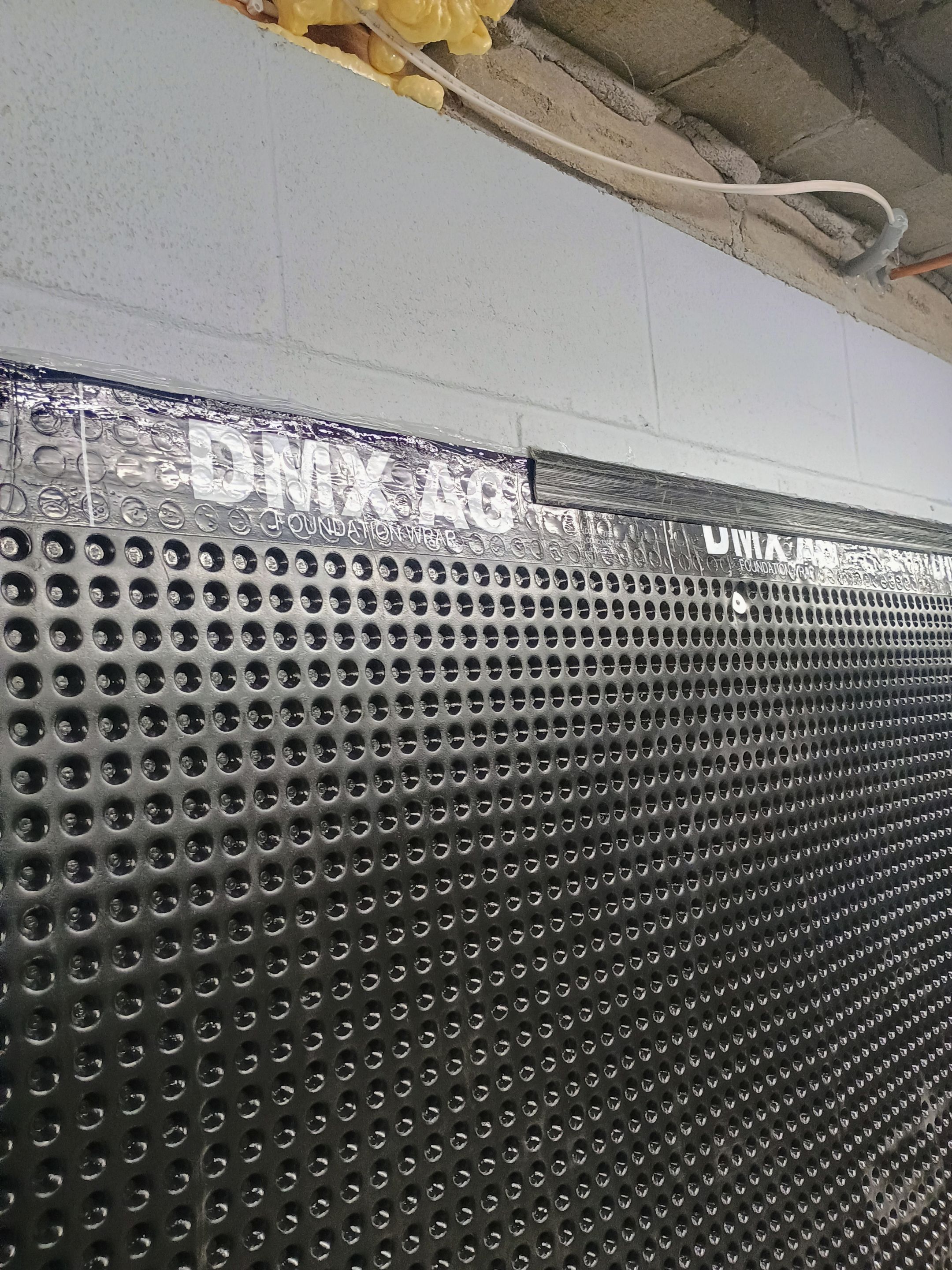 Depressurizing Denny's Basement Wall by Waterproofing Northeast