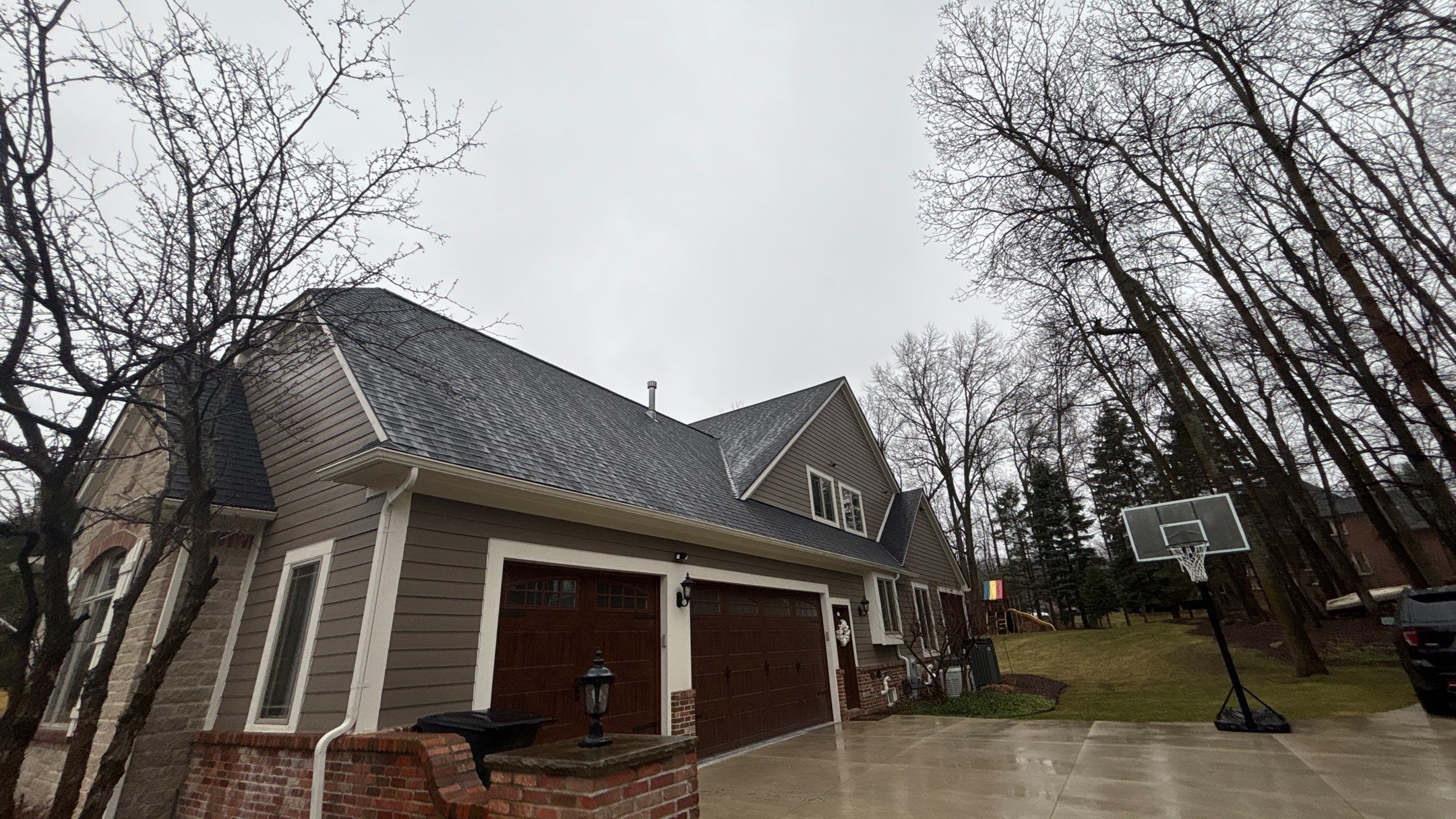 Roof Replacement using CertainTeed Landmark Moire Black by 180 Contractors