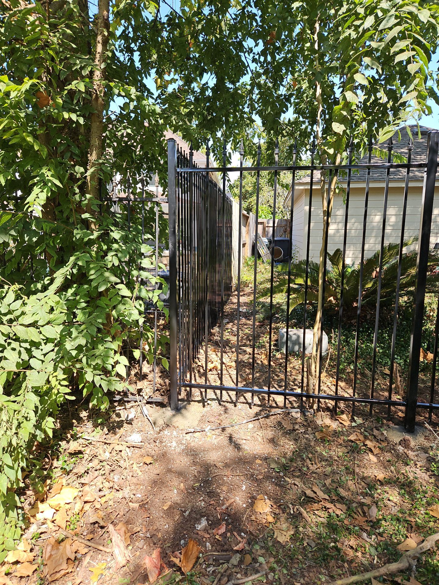 Iron fence installation using LION iron panel - 2 Rail, 6ft Tall by Tim's Fences