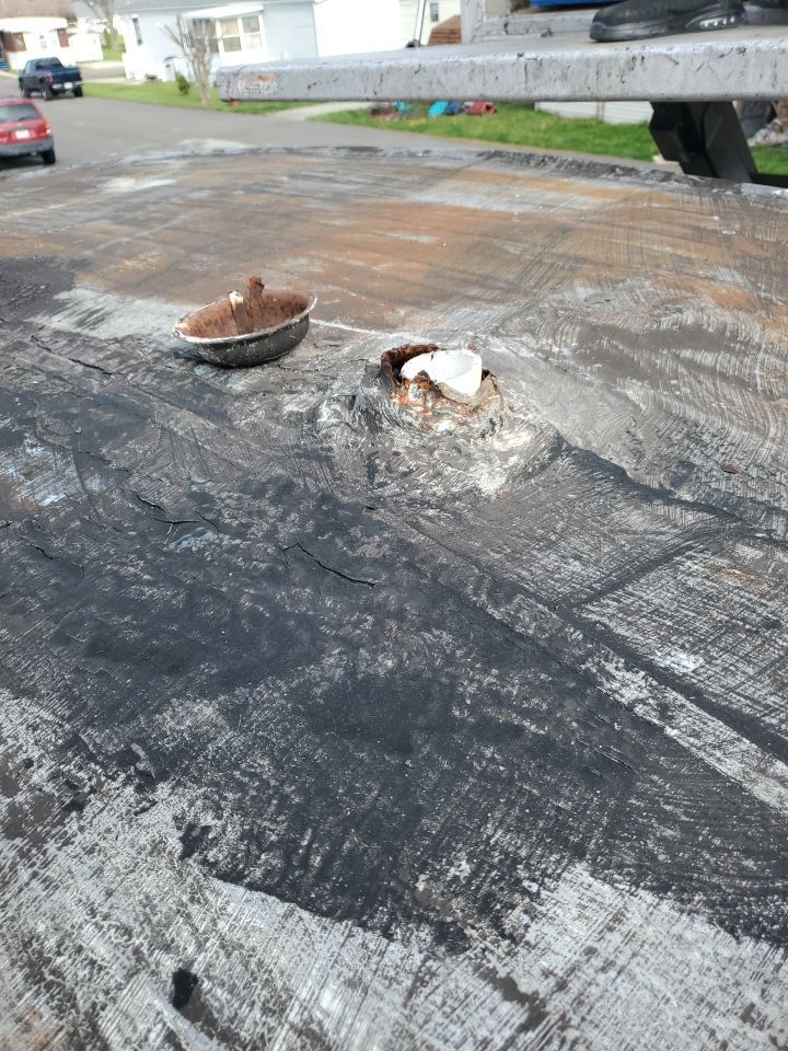 Residential Roofing Installation using 60 mil rubber roof  by Nitro Roofing and Construction