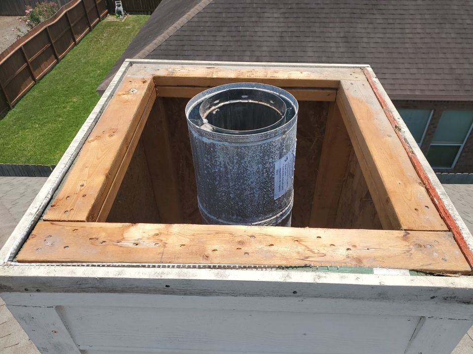 Chimney Cap Replacement using Custom Fabricated Stainless Steel by Lighthouse Roofing