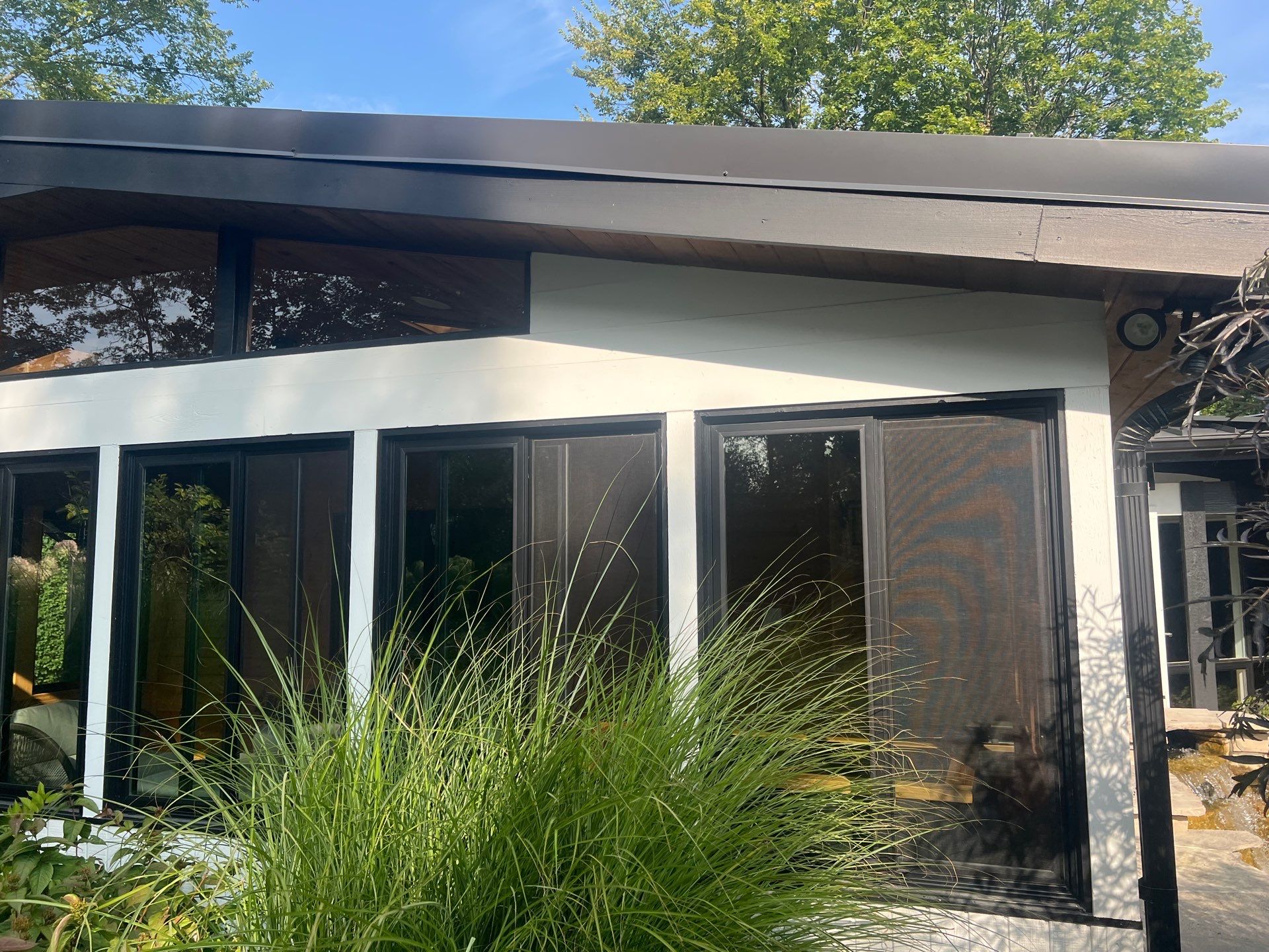 Complete Exterior House, Bluestone & Garage Floor Cleaning by Northern Power Washing LLC.
