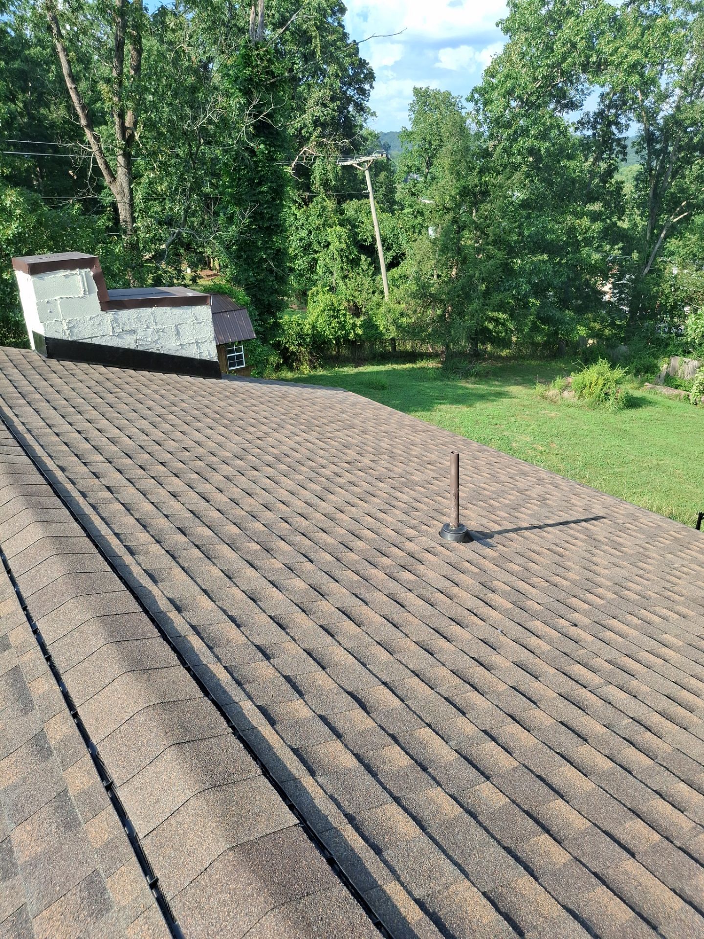 Residential Roofing Installation using GAF Timberline HDZ Barkwood by Rainstoppers Roofing